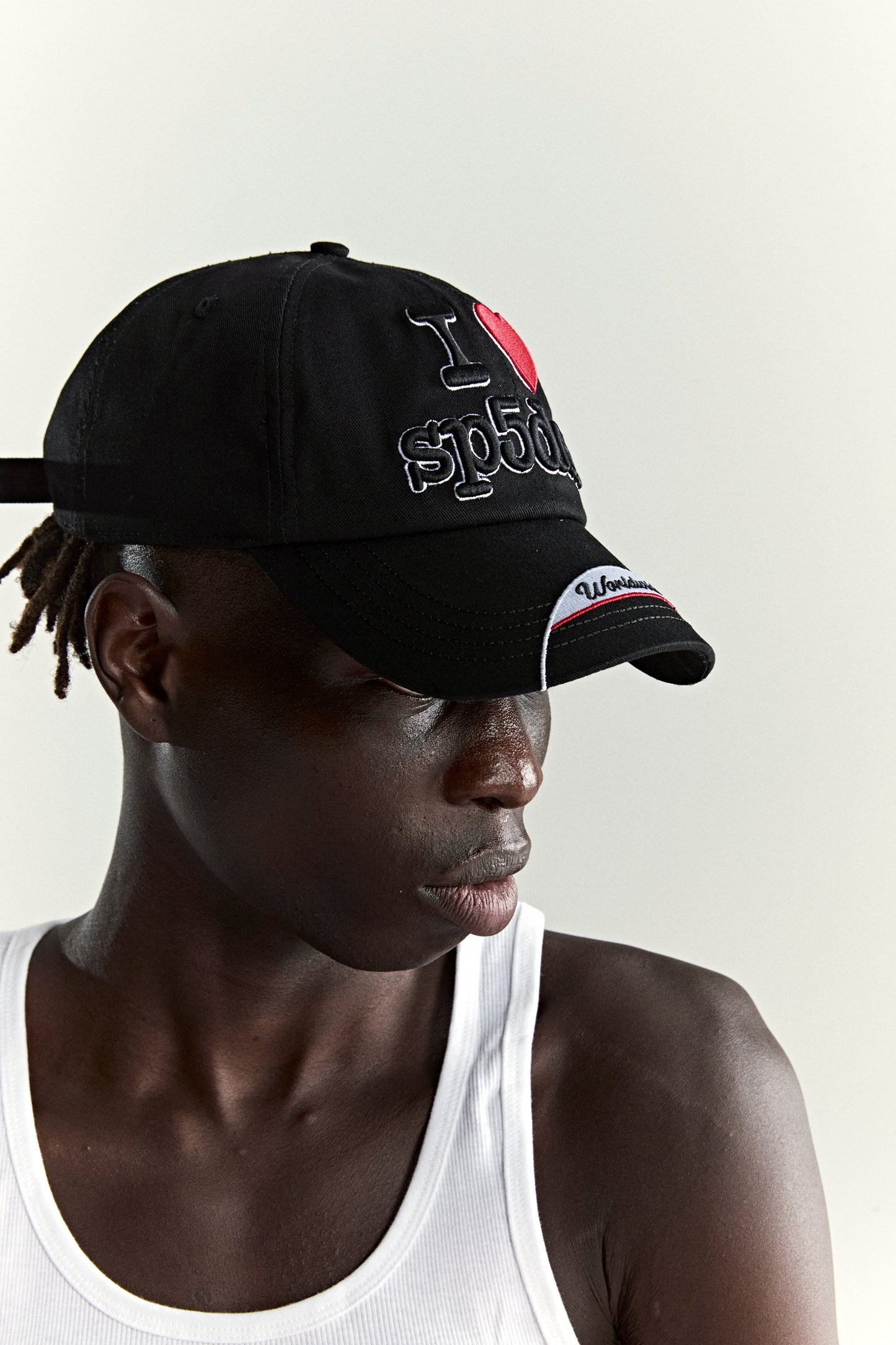 BLACK SOUVENIR 6-PANEL HAT ON MODEL