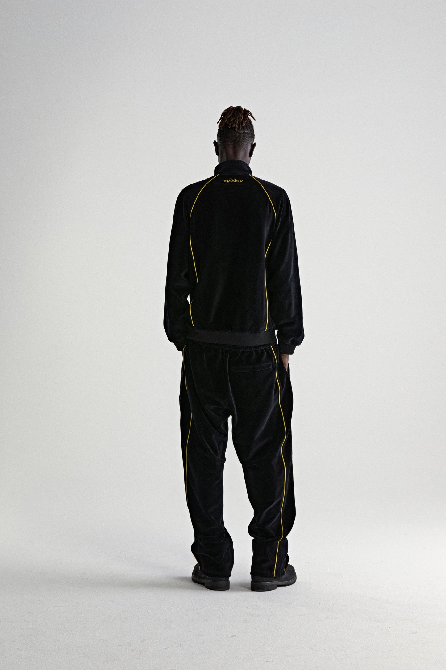 OUTLINE VELOUR TRACK JACKET ON MODEL