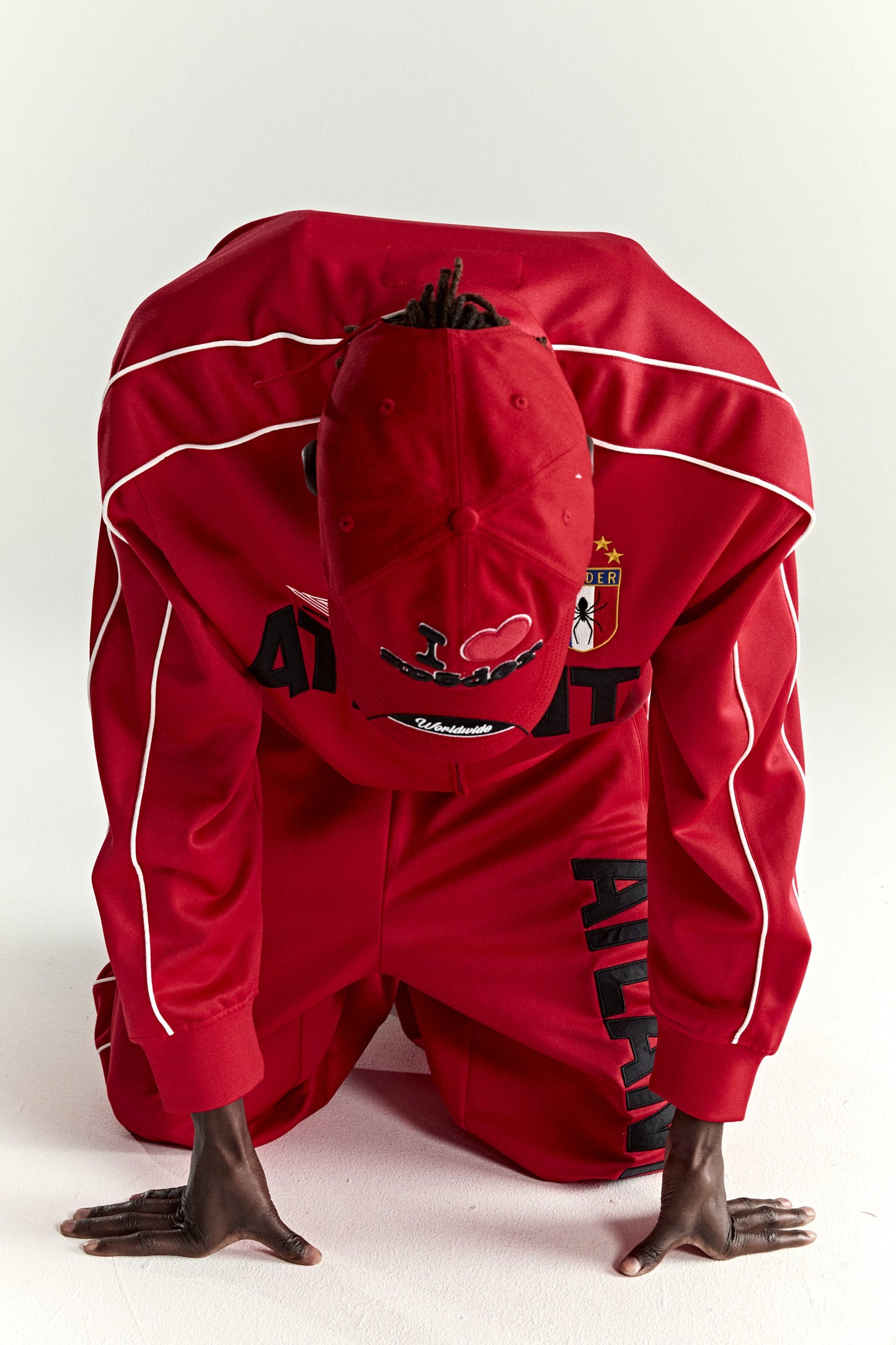 RED ATLANTA TRACK JACKET ON MODEL