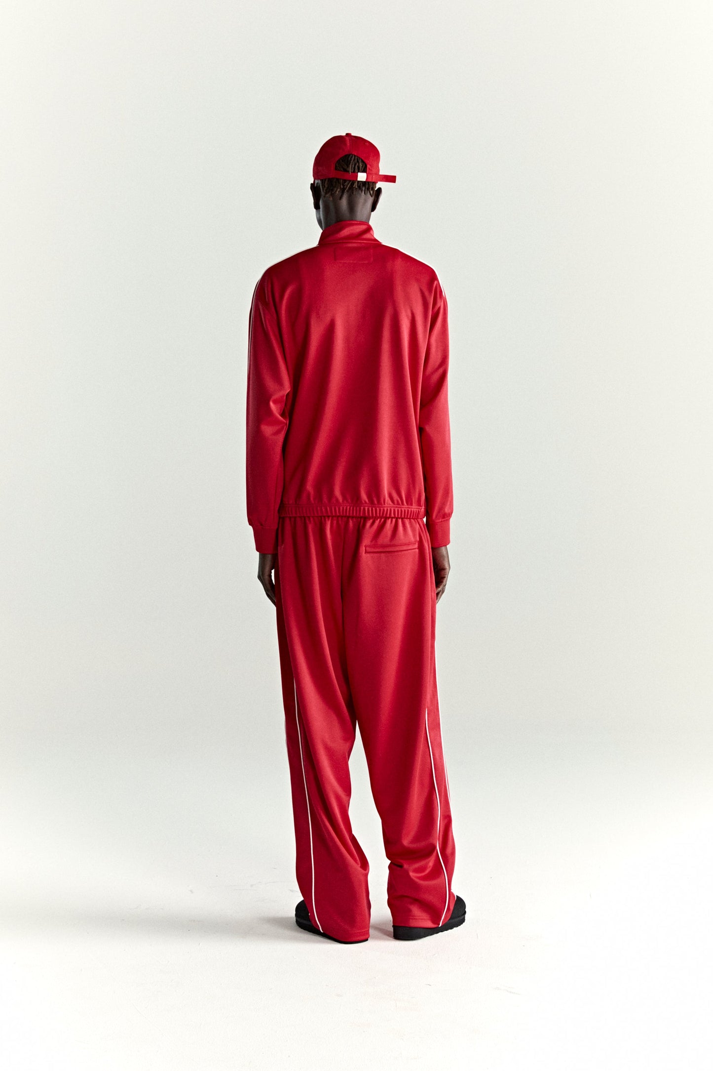 RED ATLANTA TRACK JACKET ON MODEL