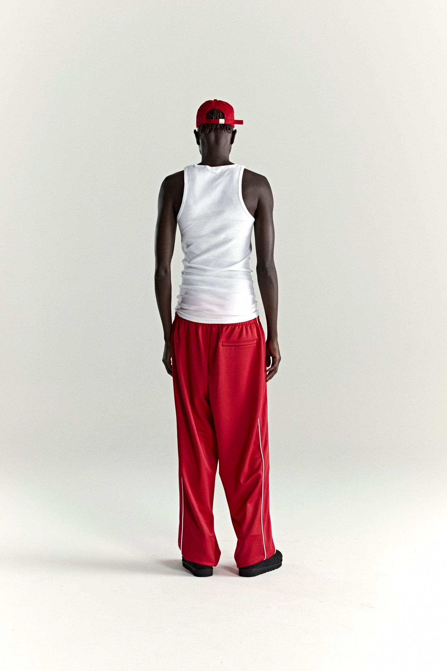 RED ATLANTA TRACK PANT ON MODEL