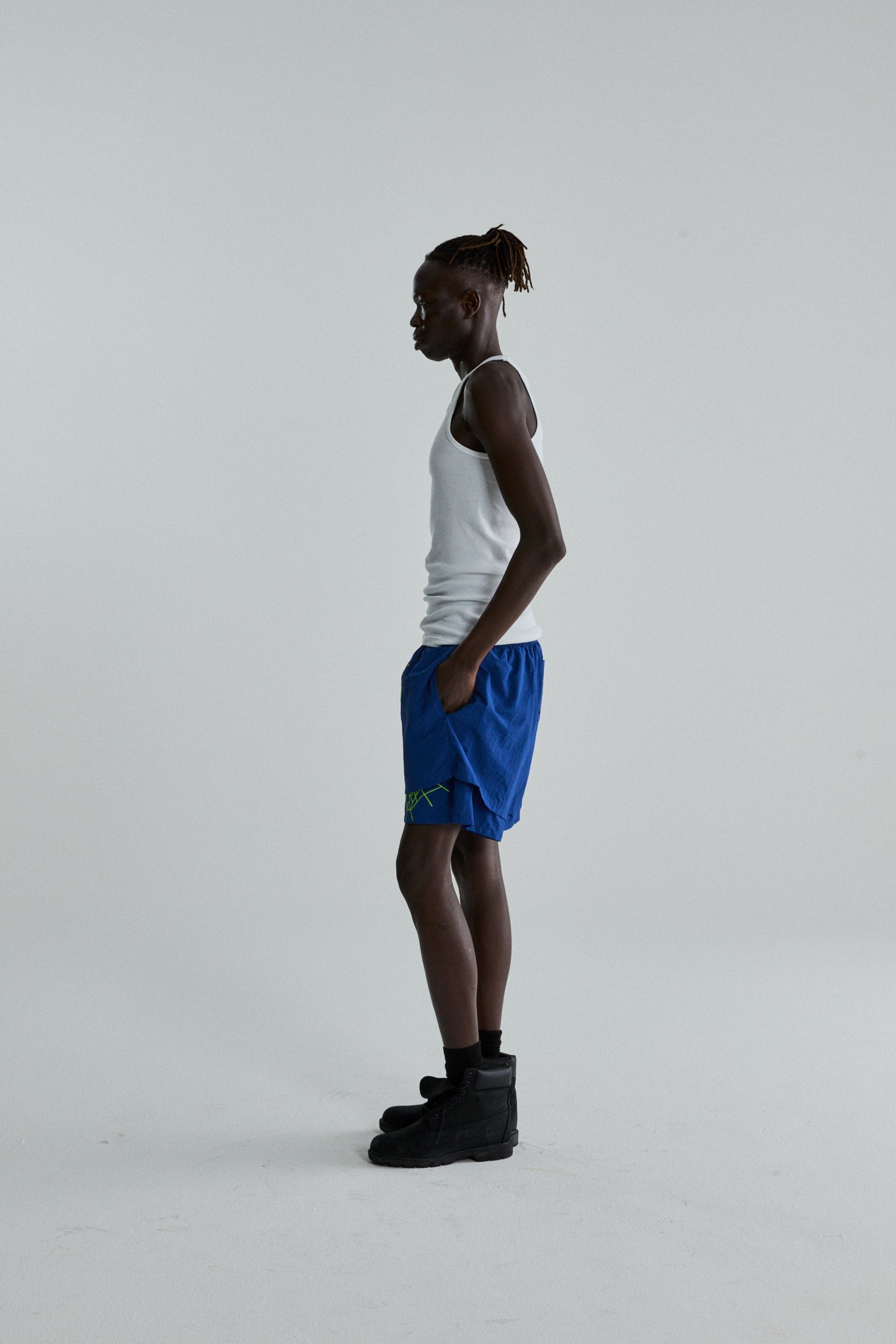 BLUE OG WEB DOUBLE LAYER SHORTS ON MODEL