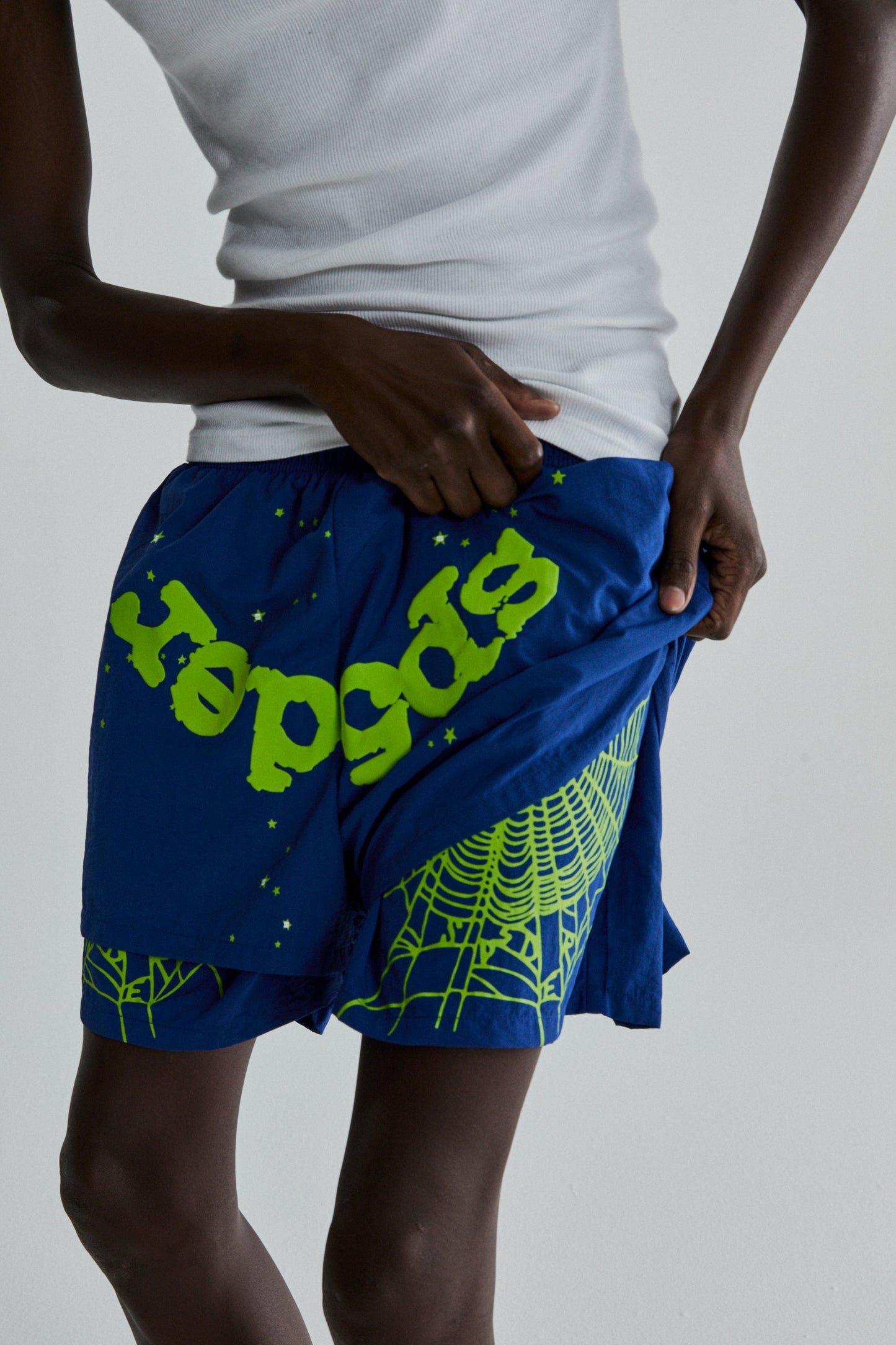 BLUE OG WEB DOUBLE LAYER SHORTS ON MODEL