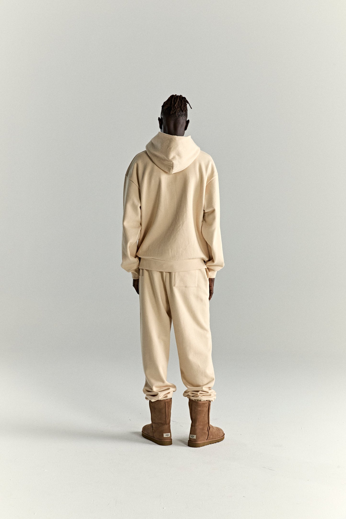 CREAM OG WEB V2 HOODIE ON MODEL