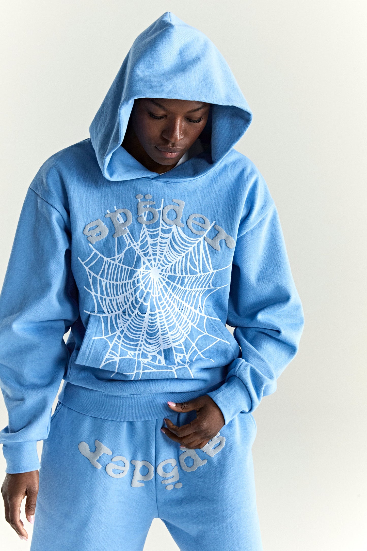 DUSTY BLUE OG WEB V2 HOODIE ON MODEL