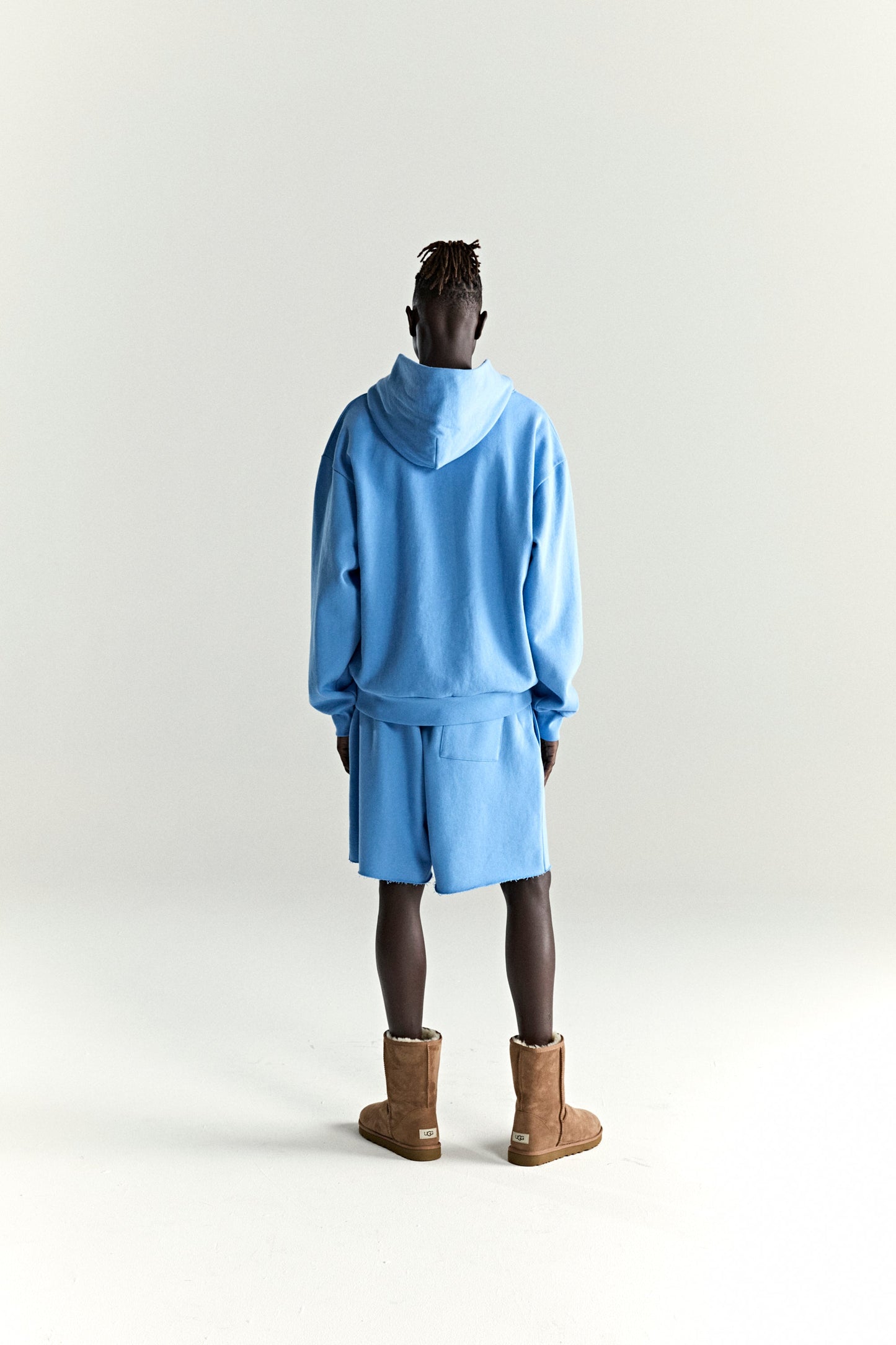 DUSTY BLUE OG WEB V2 HOODIE ON MODEL