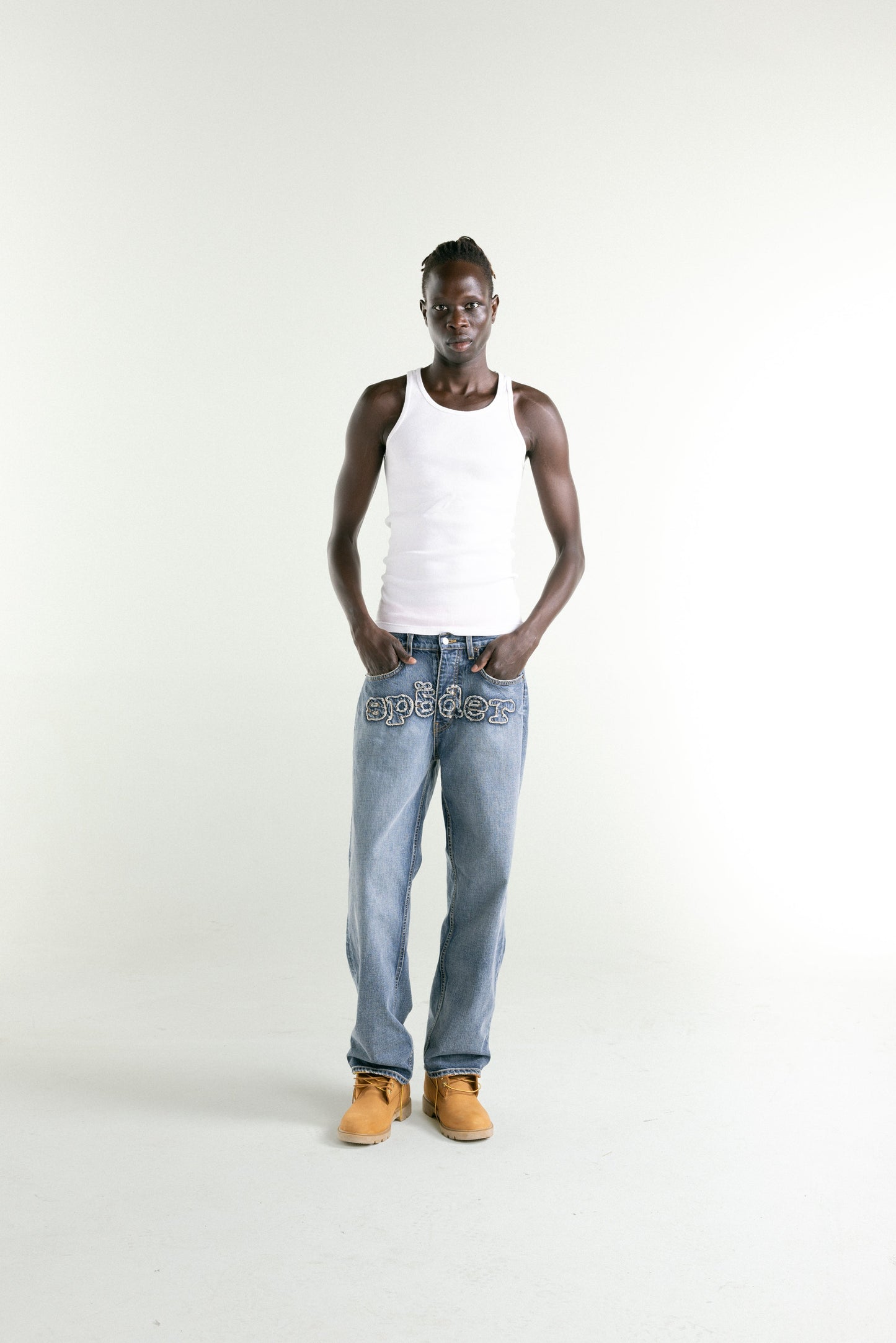 LIGHT BLUE WASH DENIM WORK PANT ON MODEL