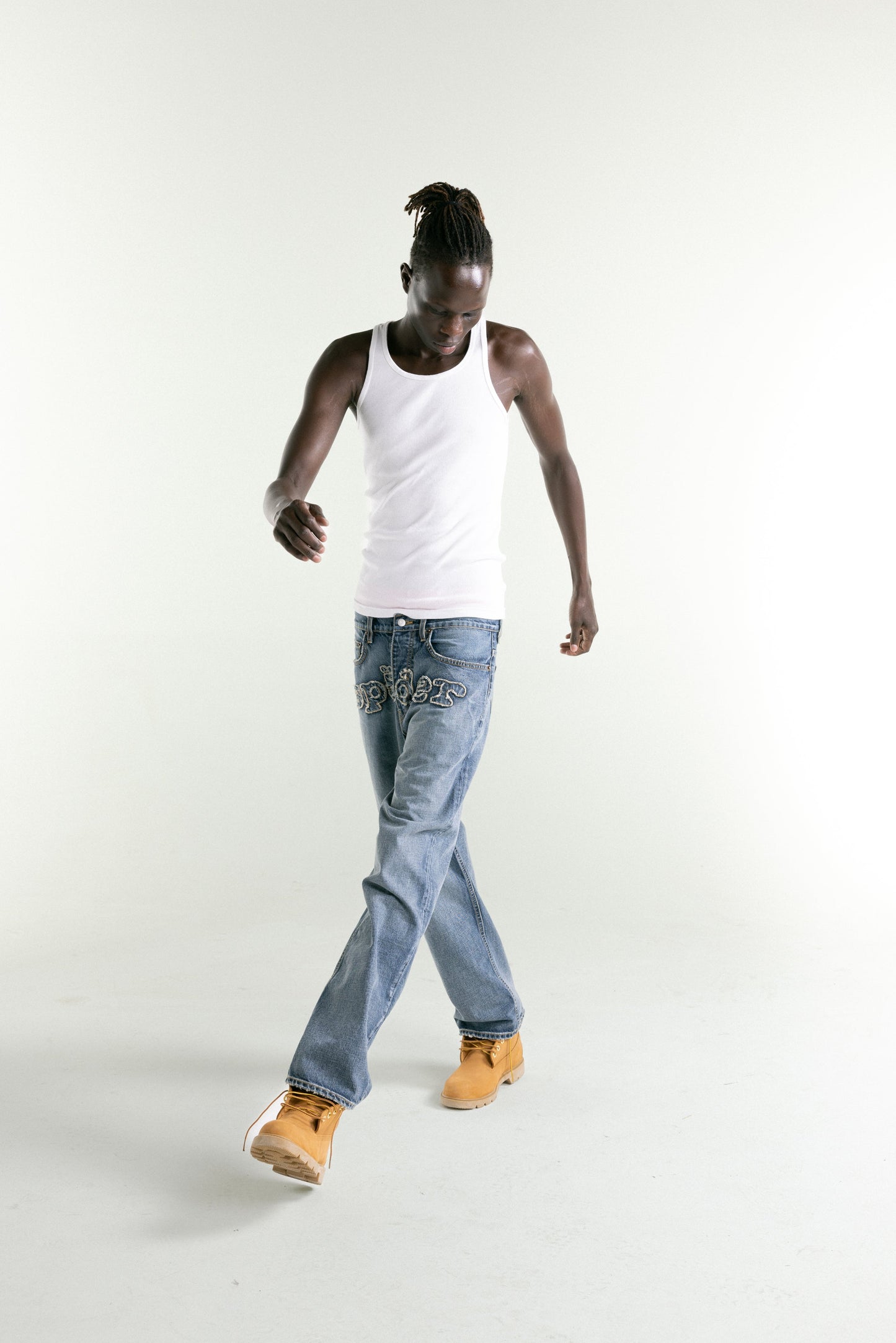 LIGHT BLUE WASH DENIM WORK PANT ON MODEL
