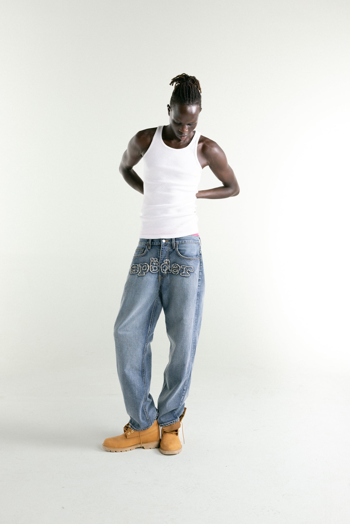 LIGHT BLUE WASH DENIM WORK PANT ON MODEL