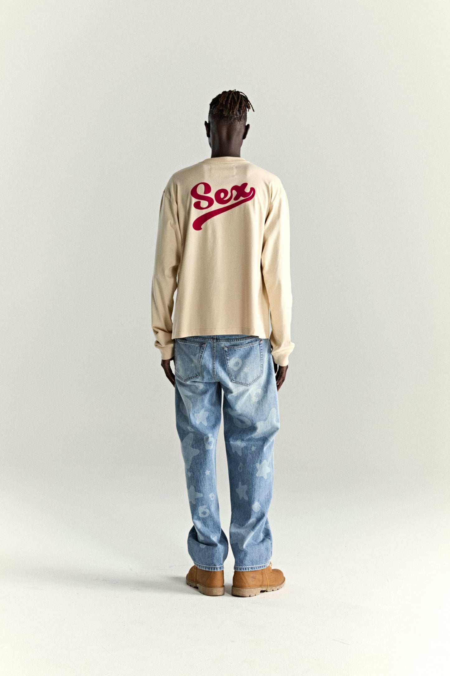 CREAM PORNSTAR LONGSLEEVE TEE ON MODEL