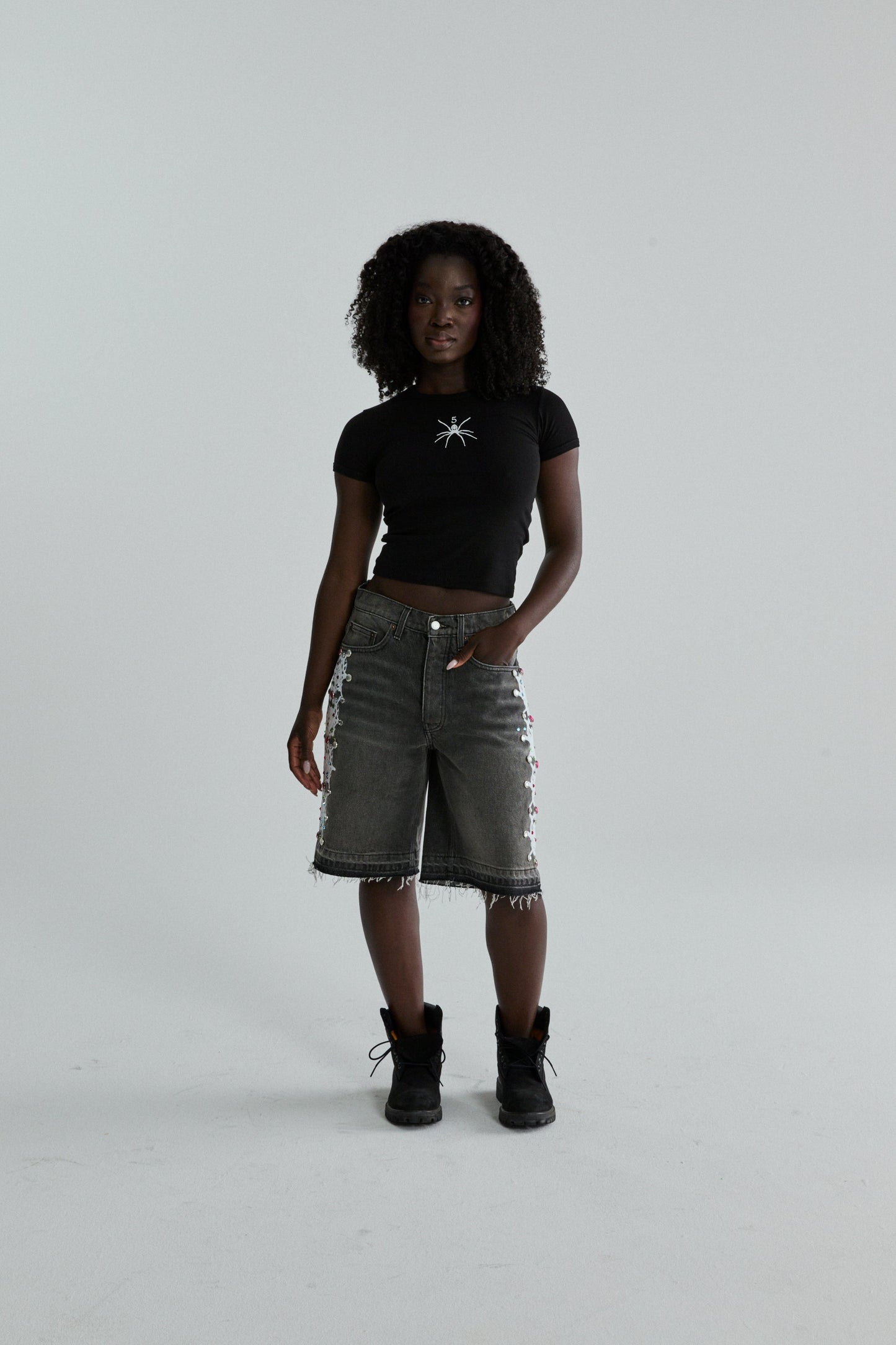 BLACK TM BABY TEE ON MODEL