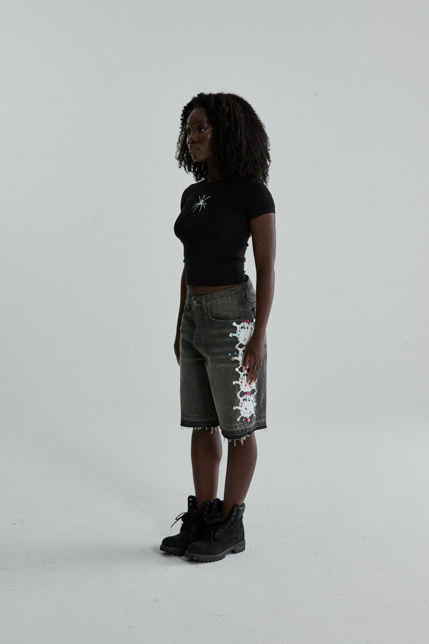 BLACK TM BABY TEE ON MODEL