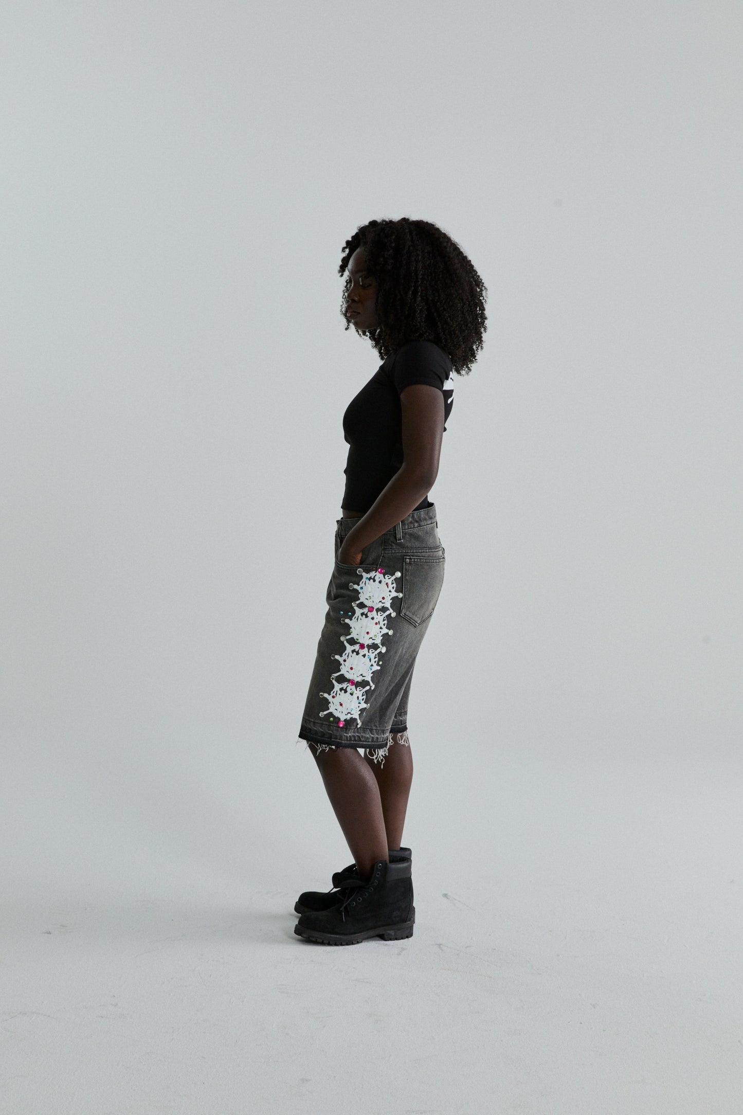 BLACK TM BABY TEE ON MODEL