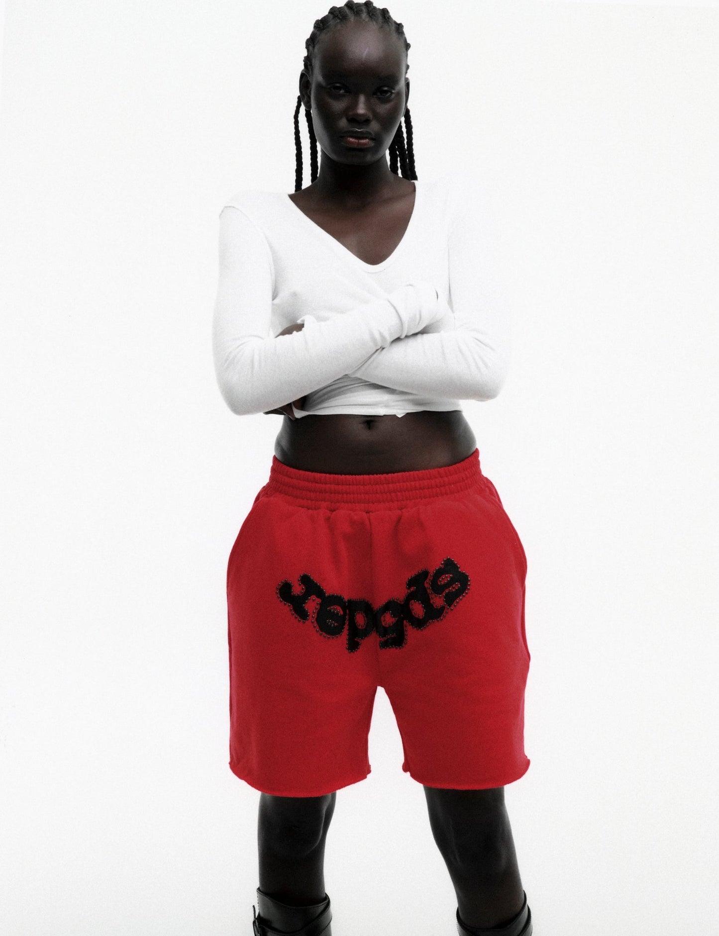 RED OG STUDDED SWEATSHORT ON MODEL