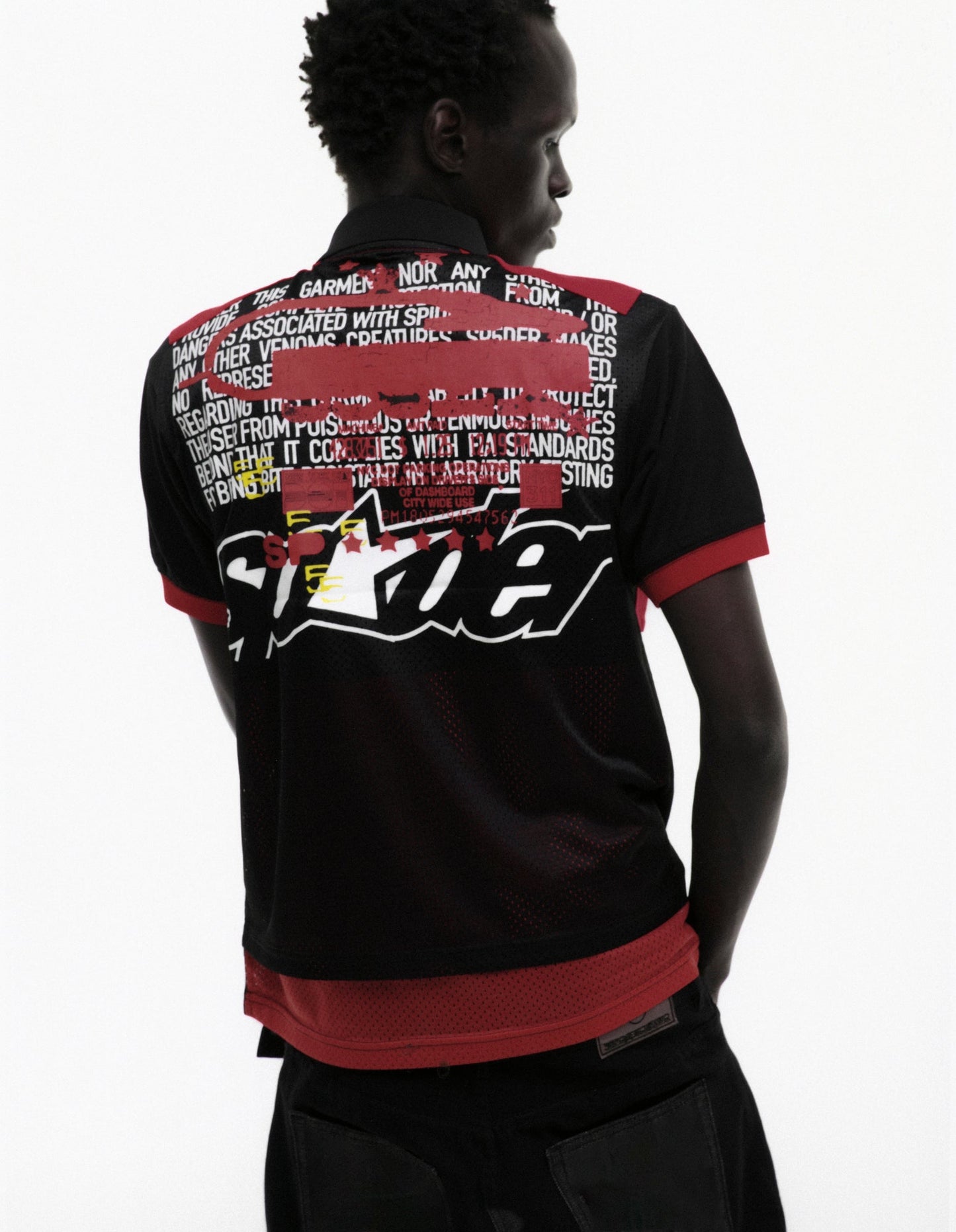BLACK RECRUIT SS POLO ON MODEL