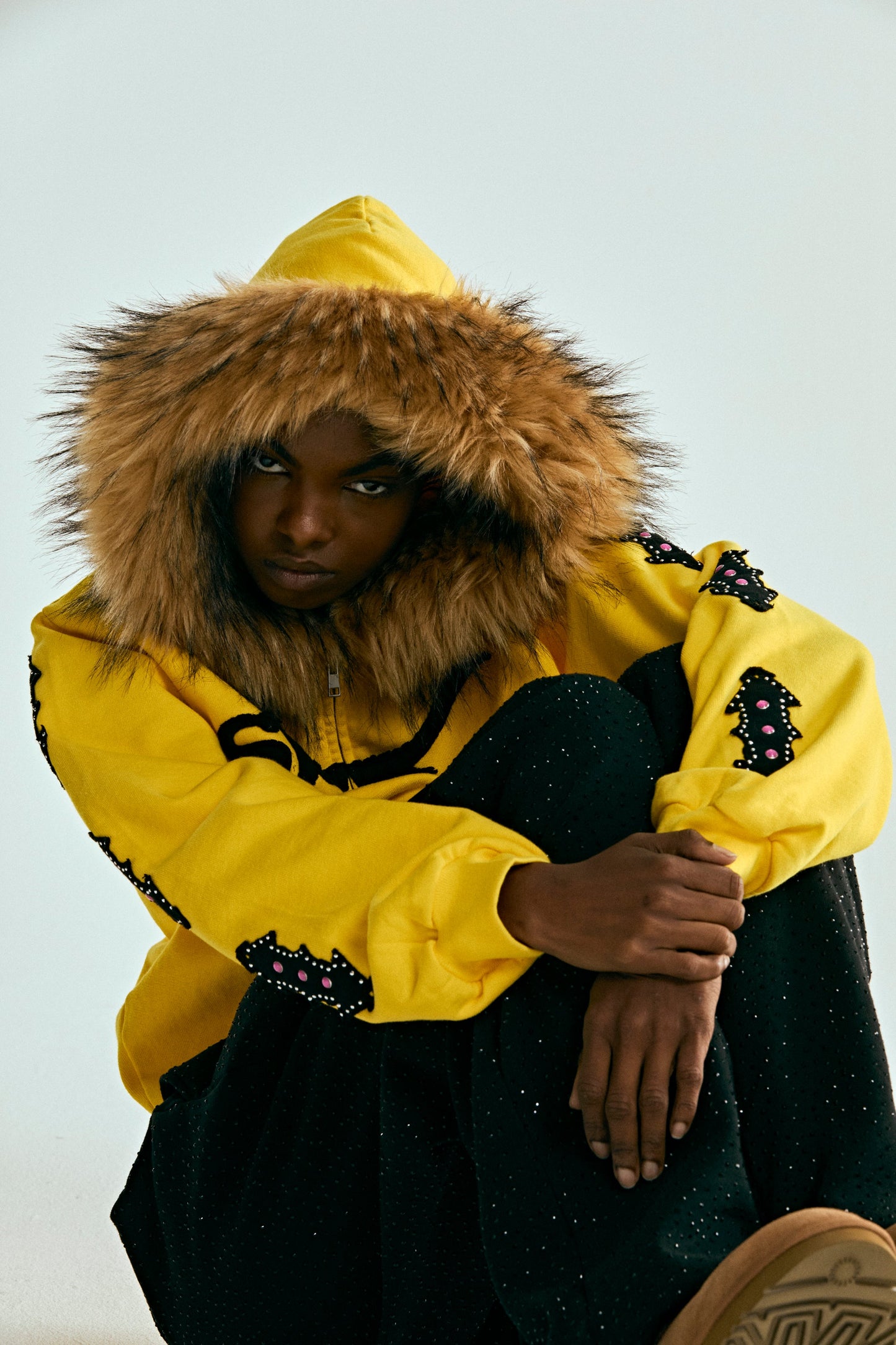 YELLOW FUR HOODED ZIP UP SWEATSHIRT ON MODEL