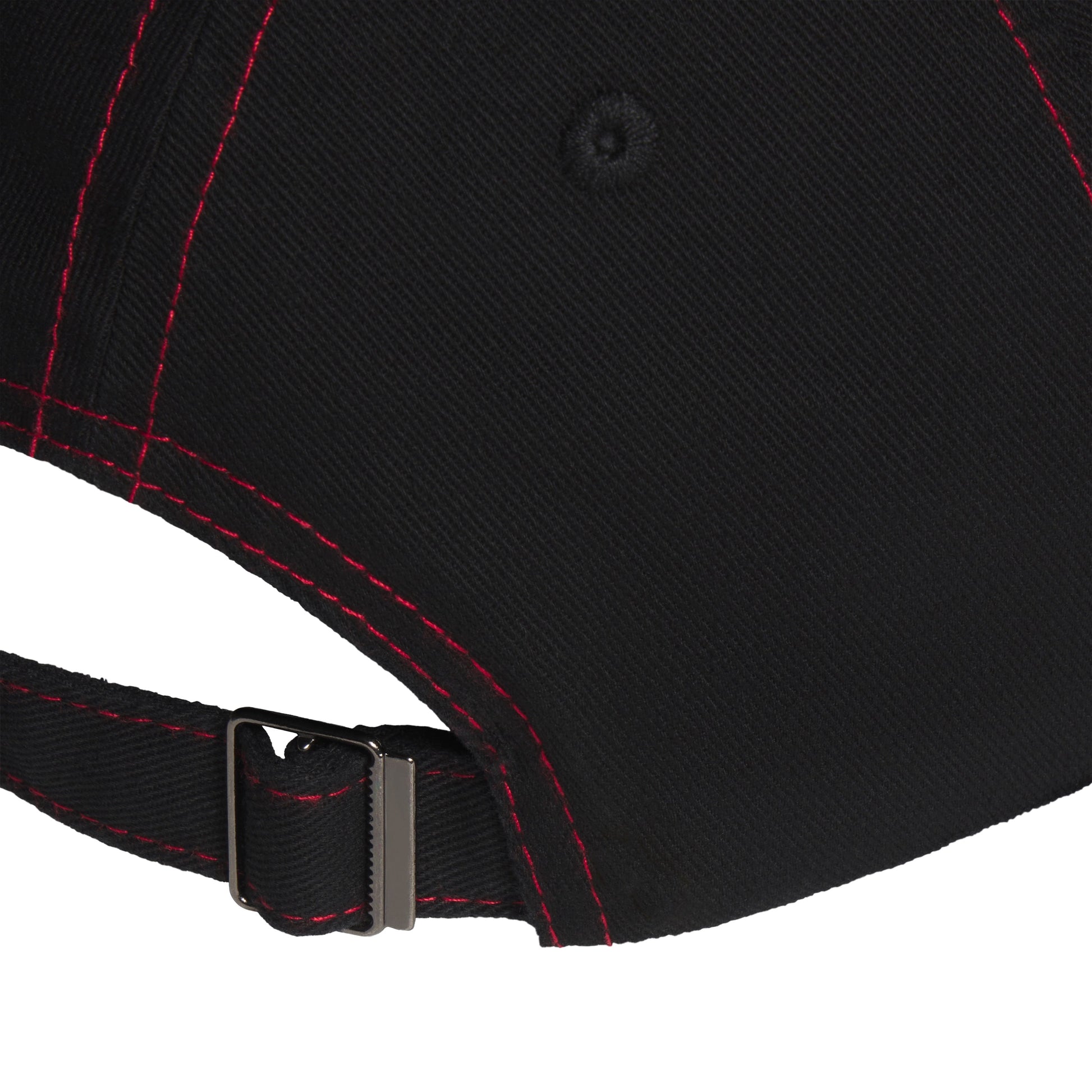 Black baseball cap with red contrast stitching and an adjustable metal buckle strap closure.