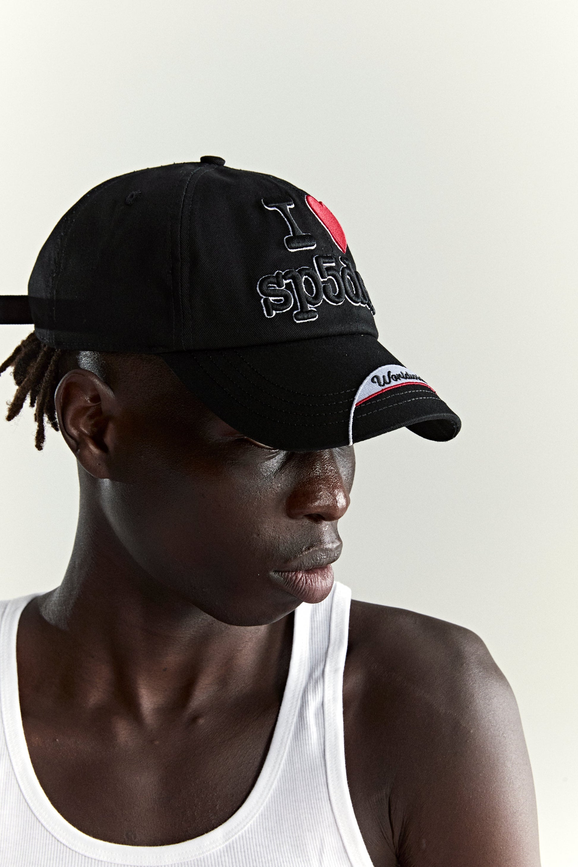 BLACK SOUVENIR 6-PANEL HAT ON MODEL