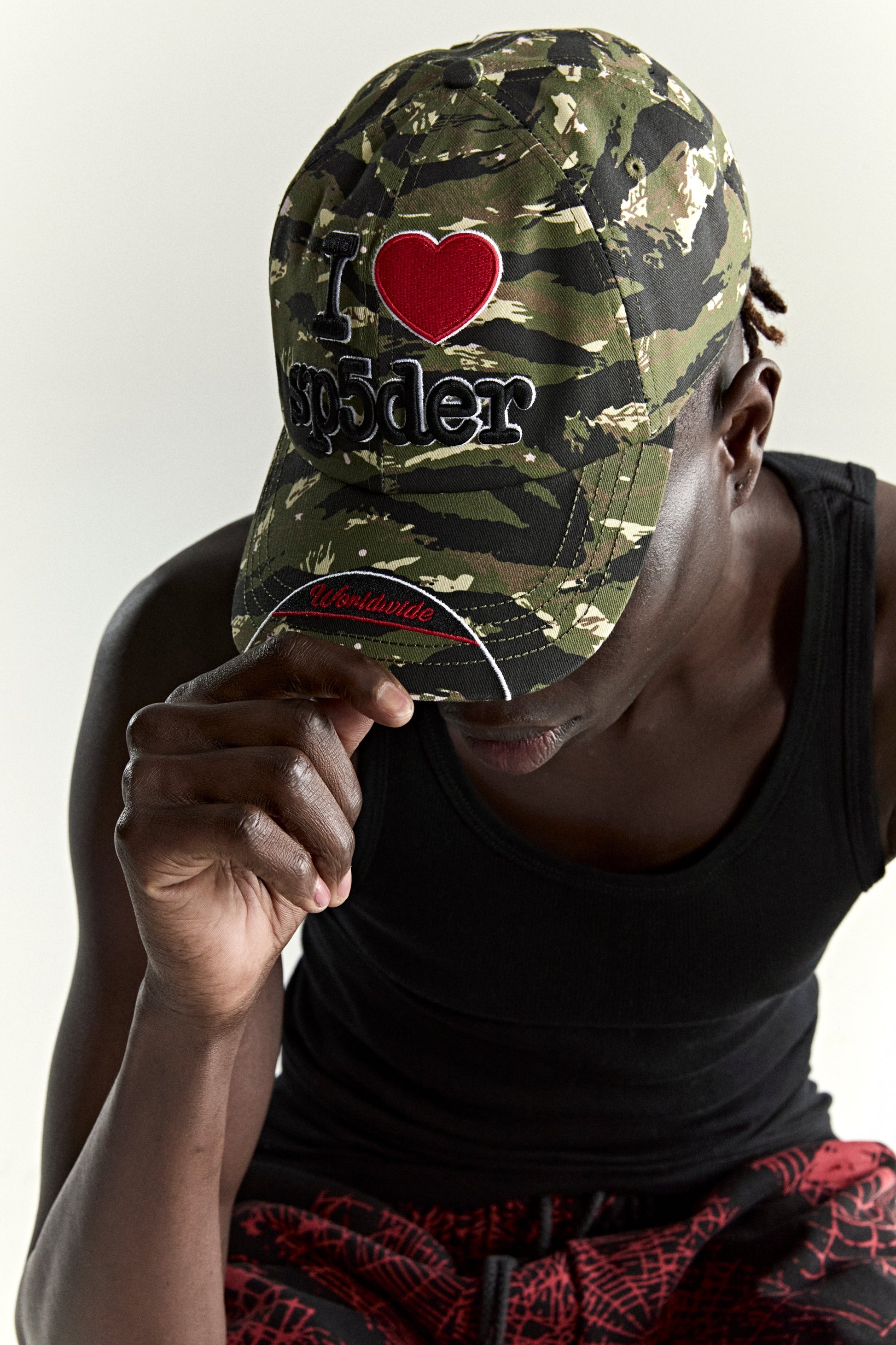 CAMO SOUVENIR 6-PANEL HAT ON MODEL