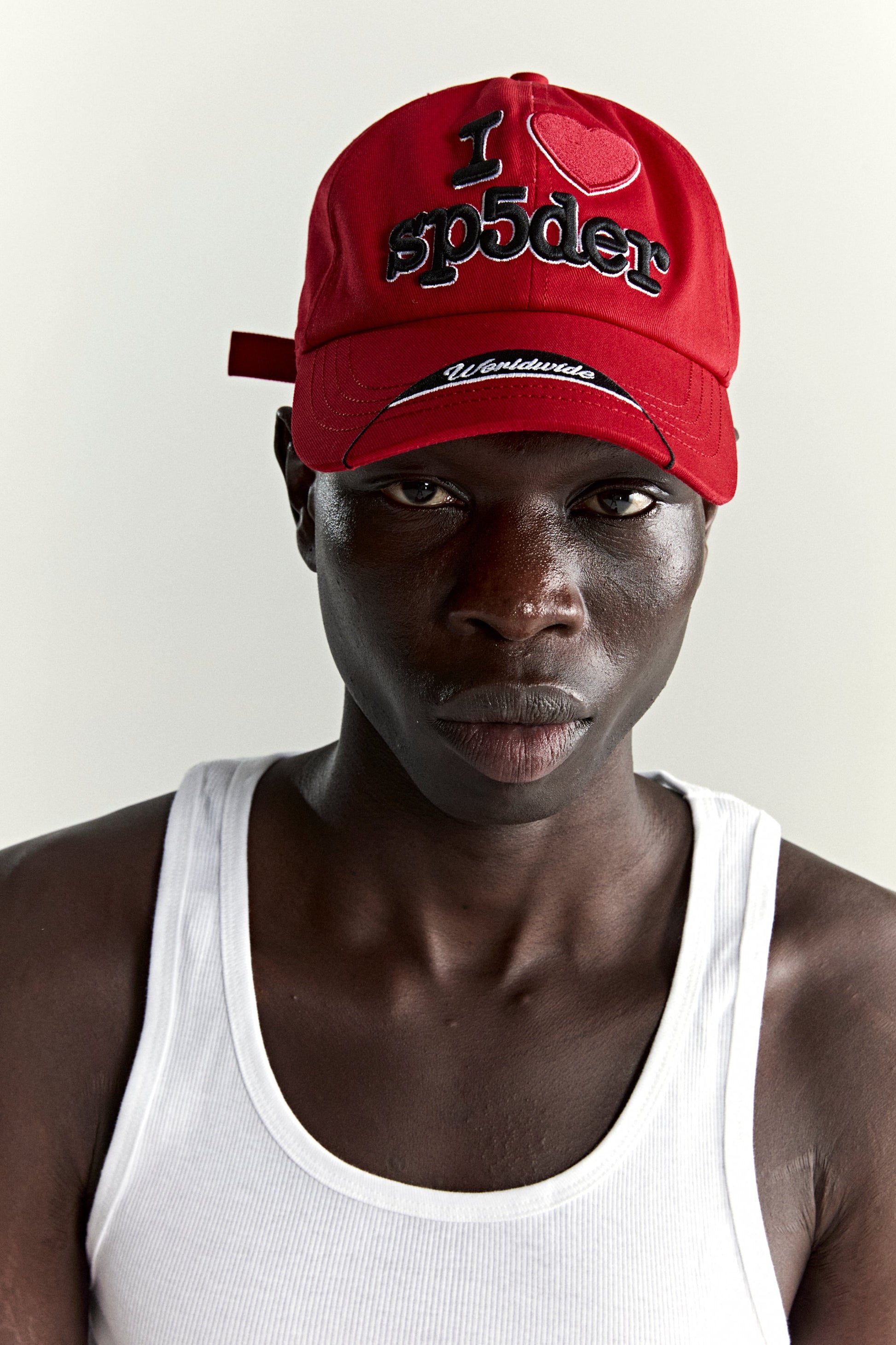 RED SOUVENIR 6-PANEL HAT ON MODEL