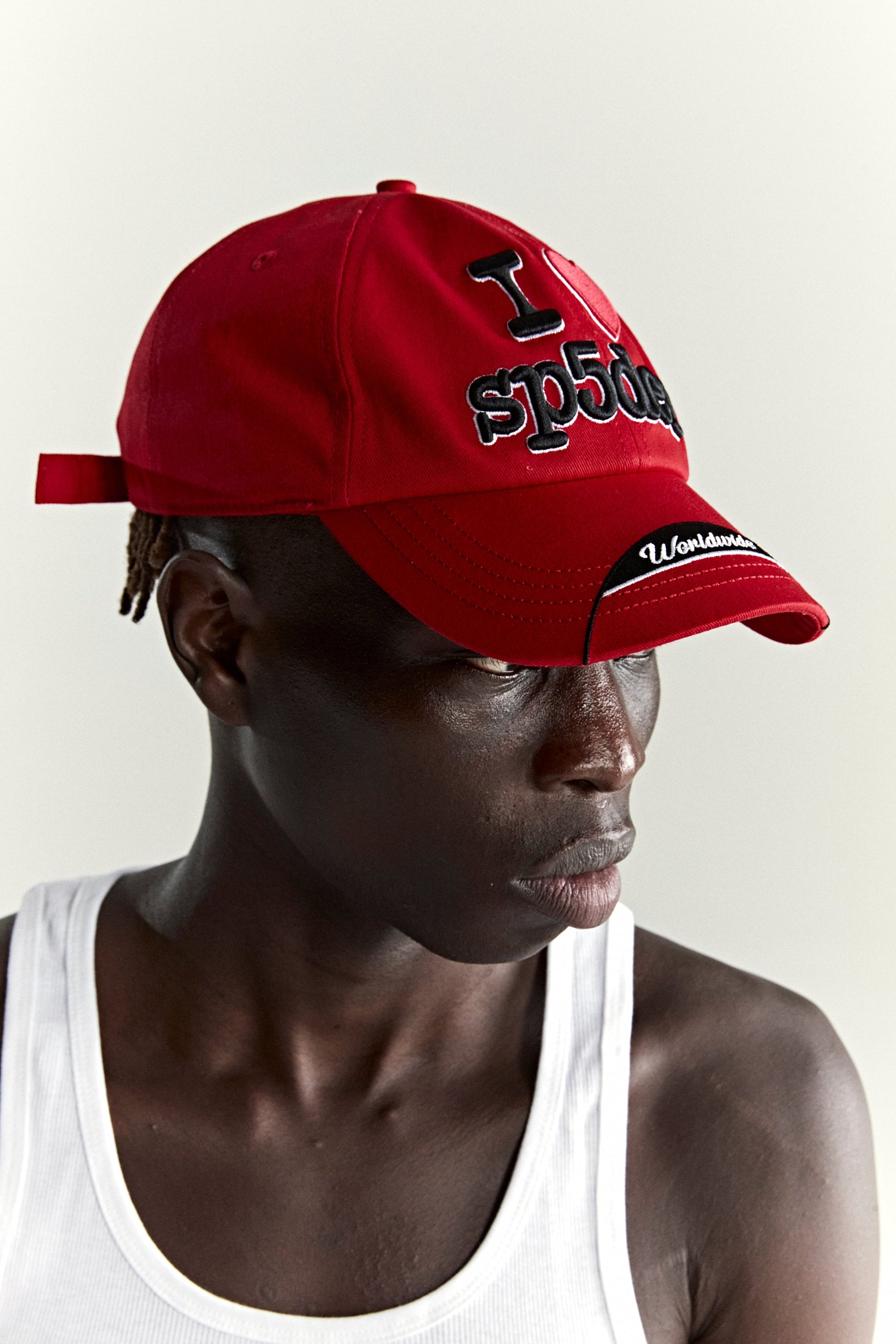 RED SOUVENIR 6-PANEL HAT ON MODEL