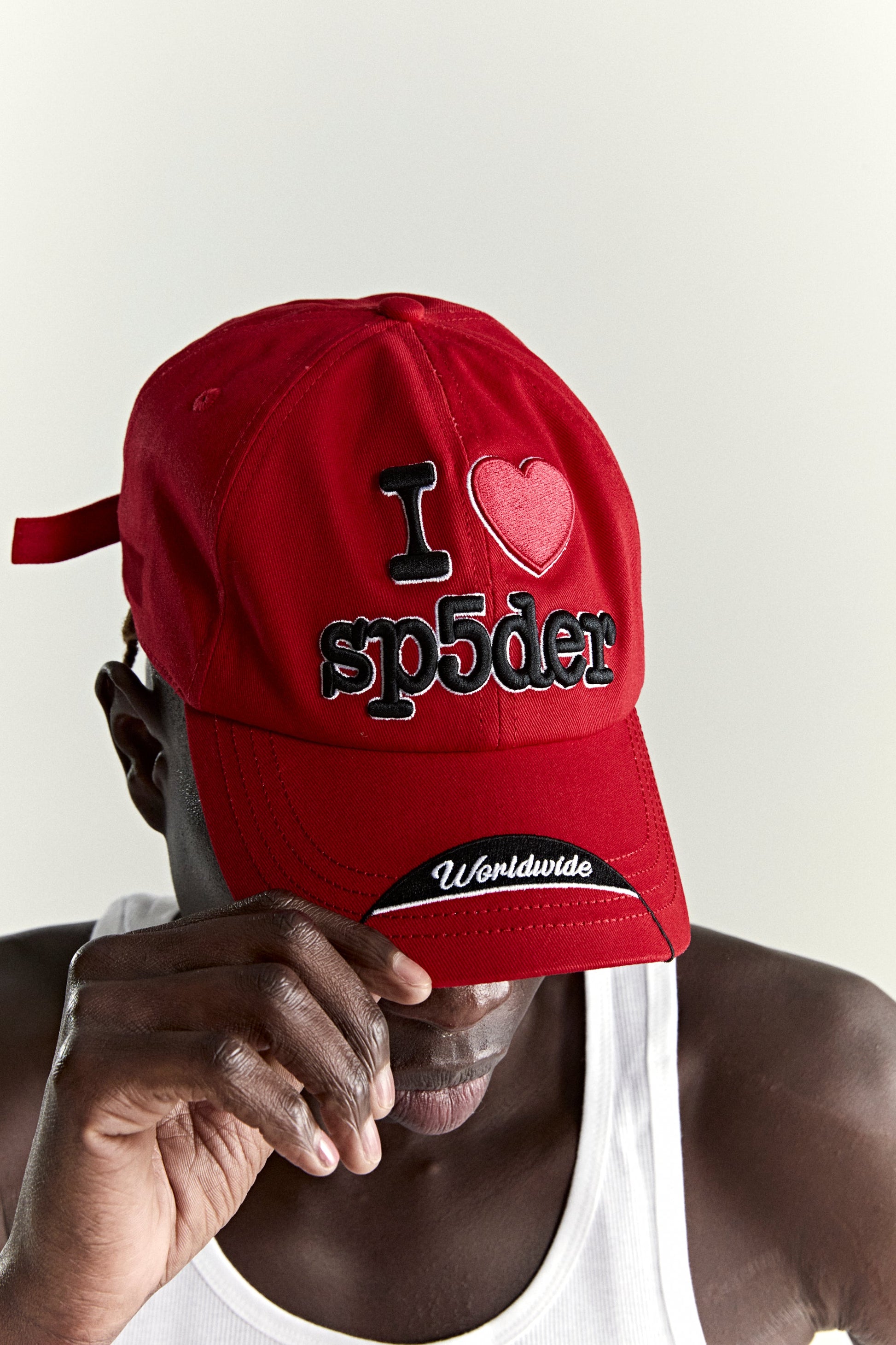 RED SOUVENIR 6-PANEL HAT ON MODEL