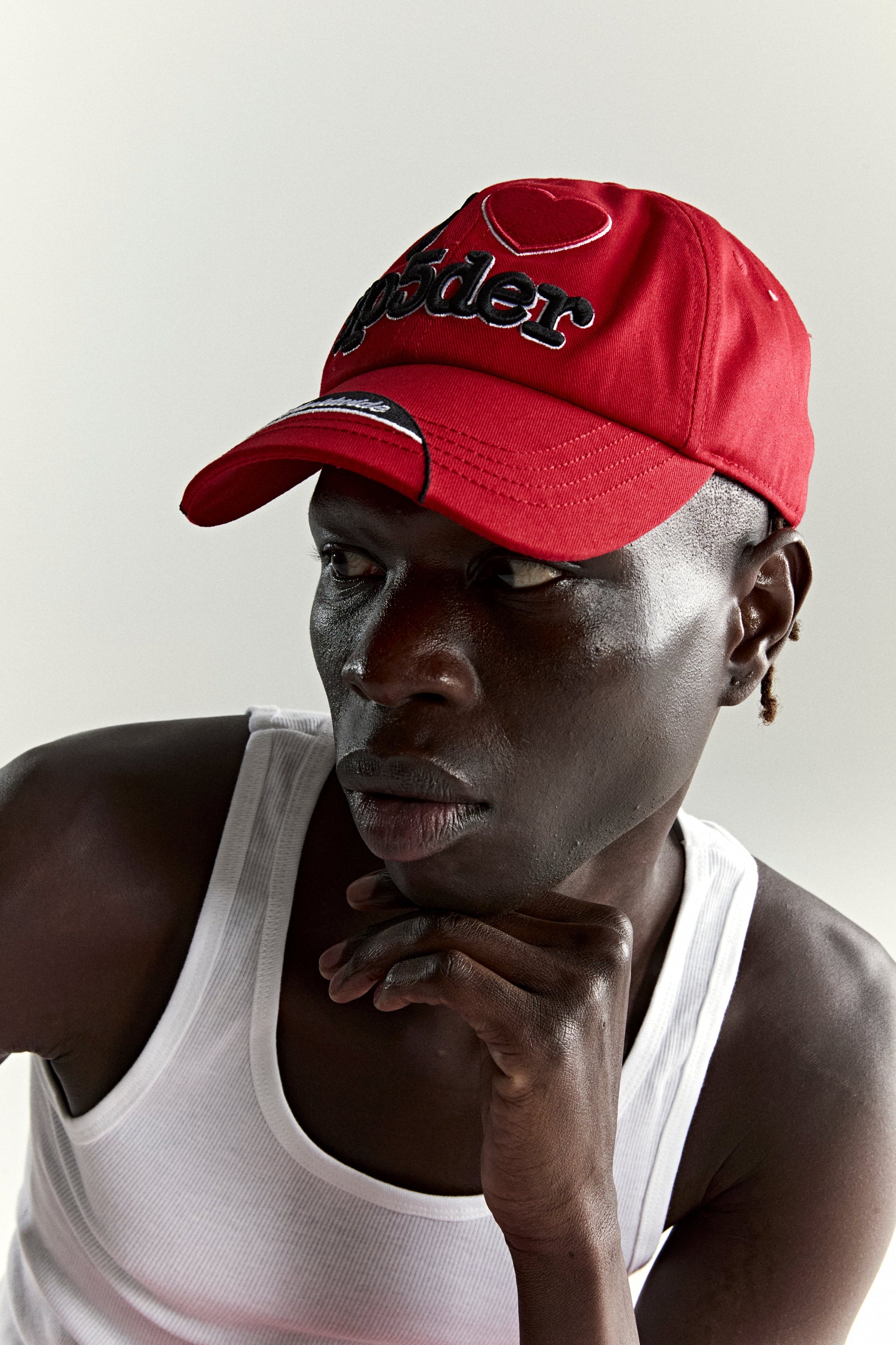 RED SOUVENIR 6-PANEL HAT ON MODEL