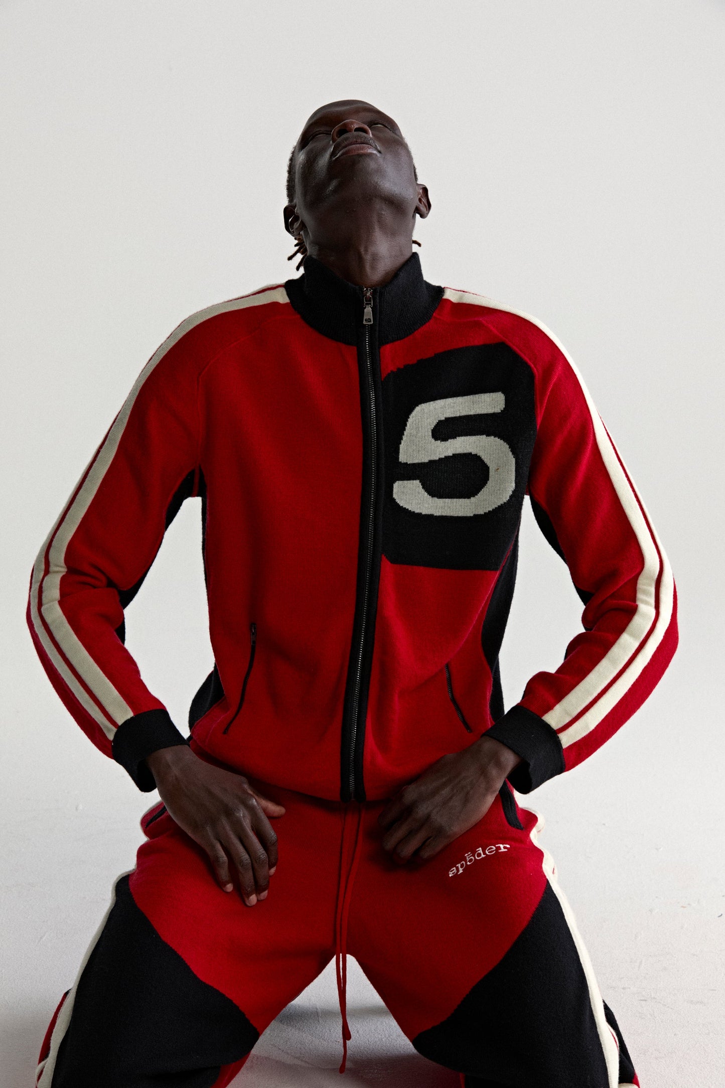 RED KNIT 5 TRACK JACKET ON MODEL