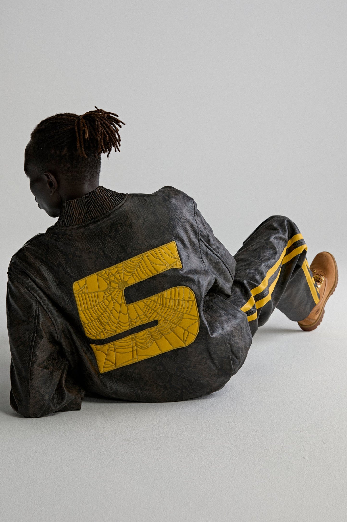 SNAKE LEATHER VARSITY BOMBER JACKET