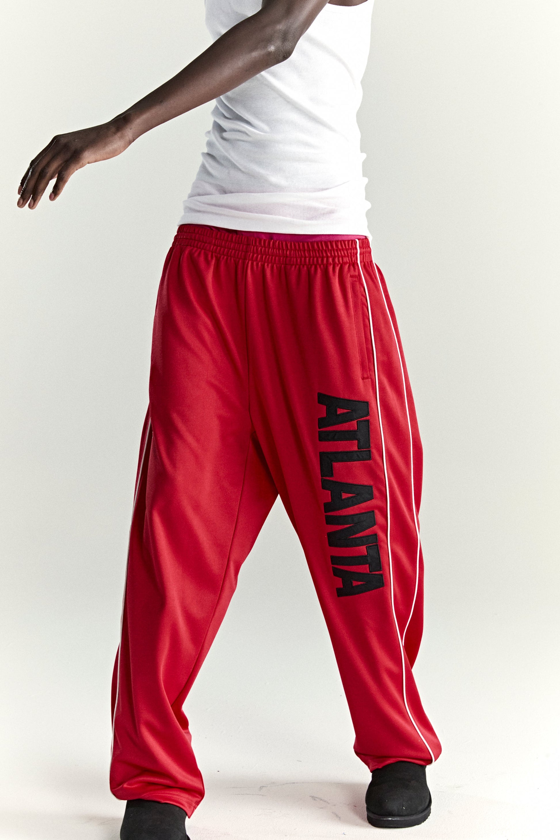 RED ATLANTA TRACK PANT ON MODEL