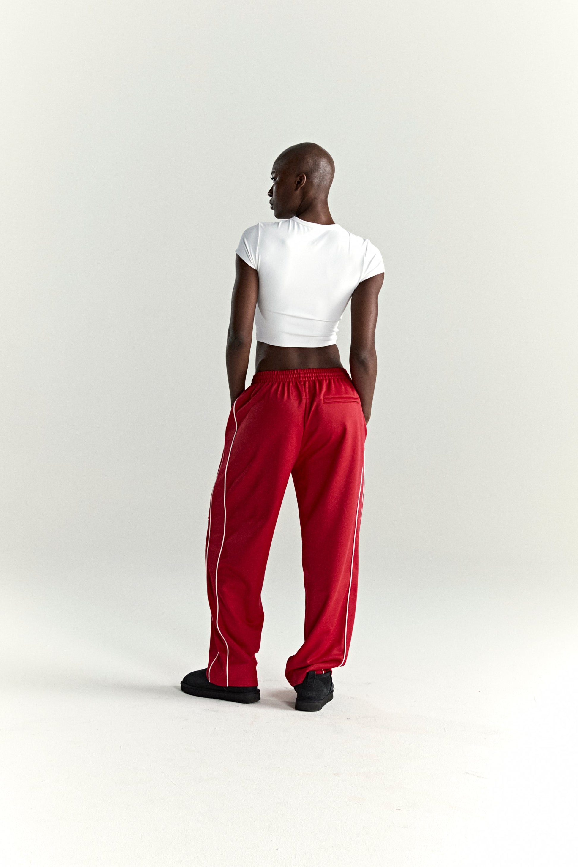 RED ATLANTA TRACK PANT ON MODEL