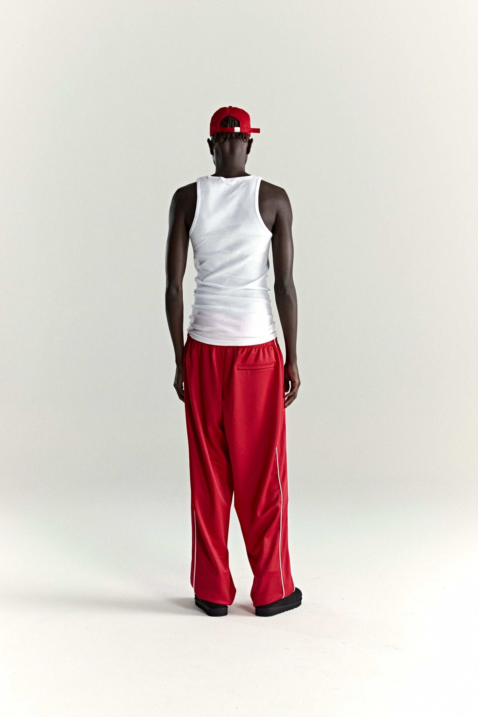 RED ATLANTA TRACK PANT ON MODEL
