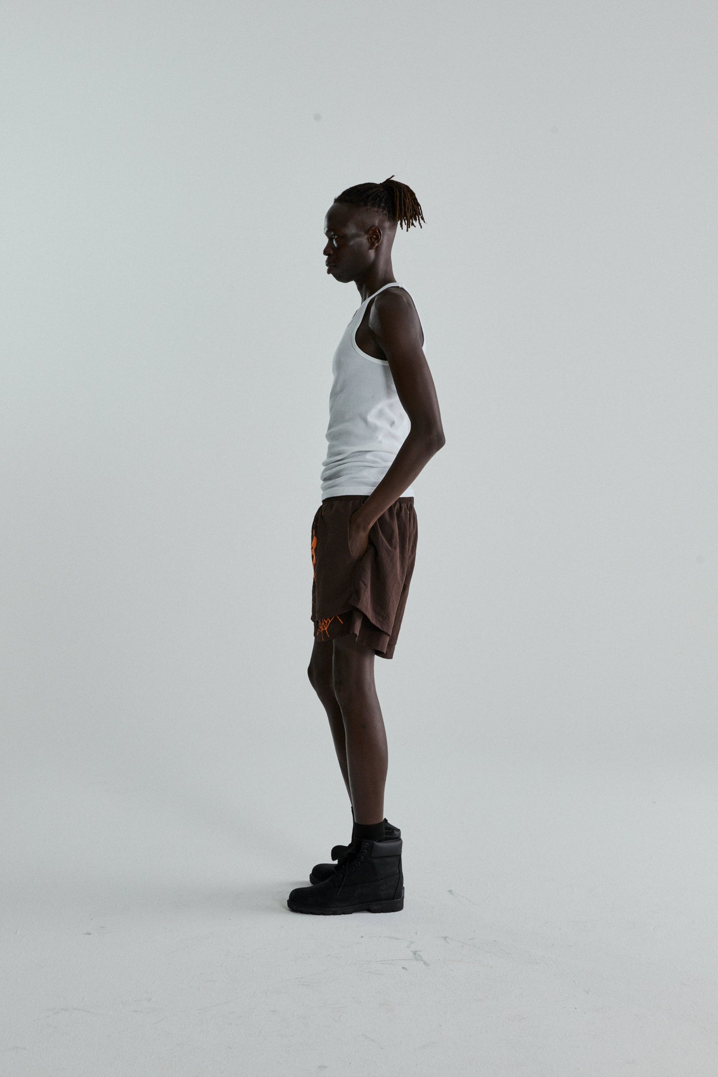 BROWN OG WEB DOUBLE LAYER SHORTS ON MODEL