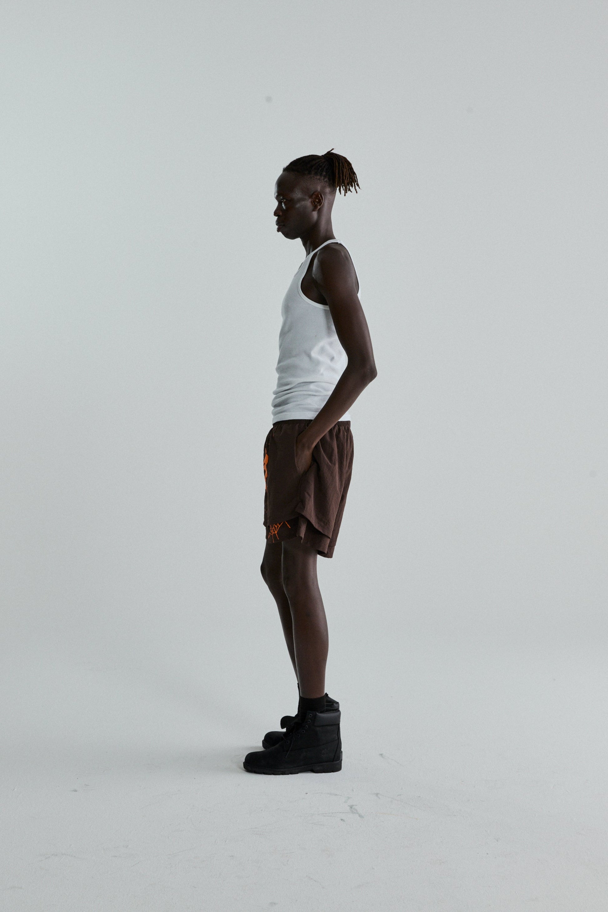 BROWN OG WEB DOUBLE LAYER SHORTS ON MODEL