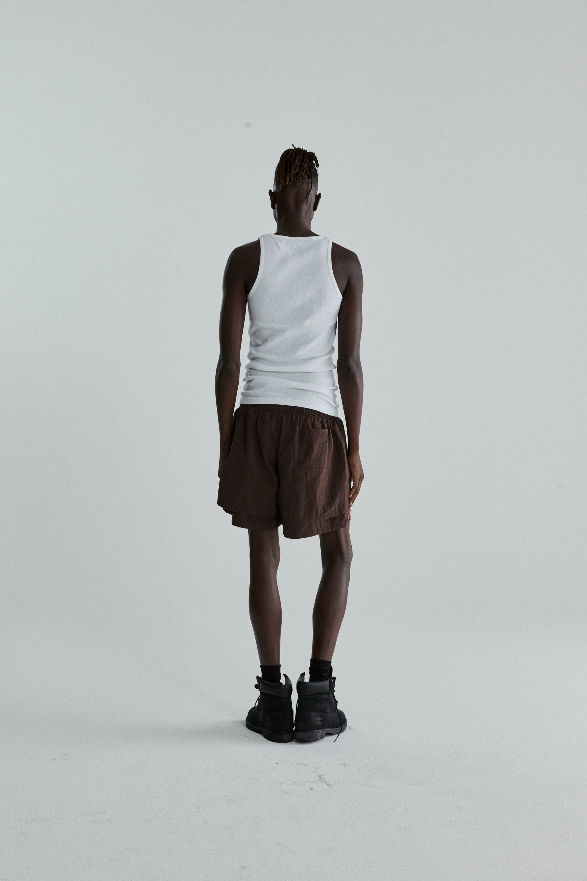 BROWN OG WEB DOUBLE LAYER SHORTS ON MODEL
