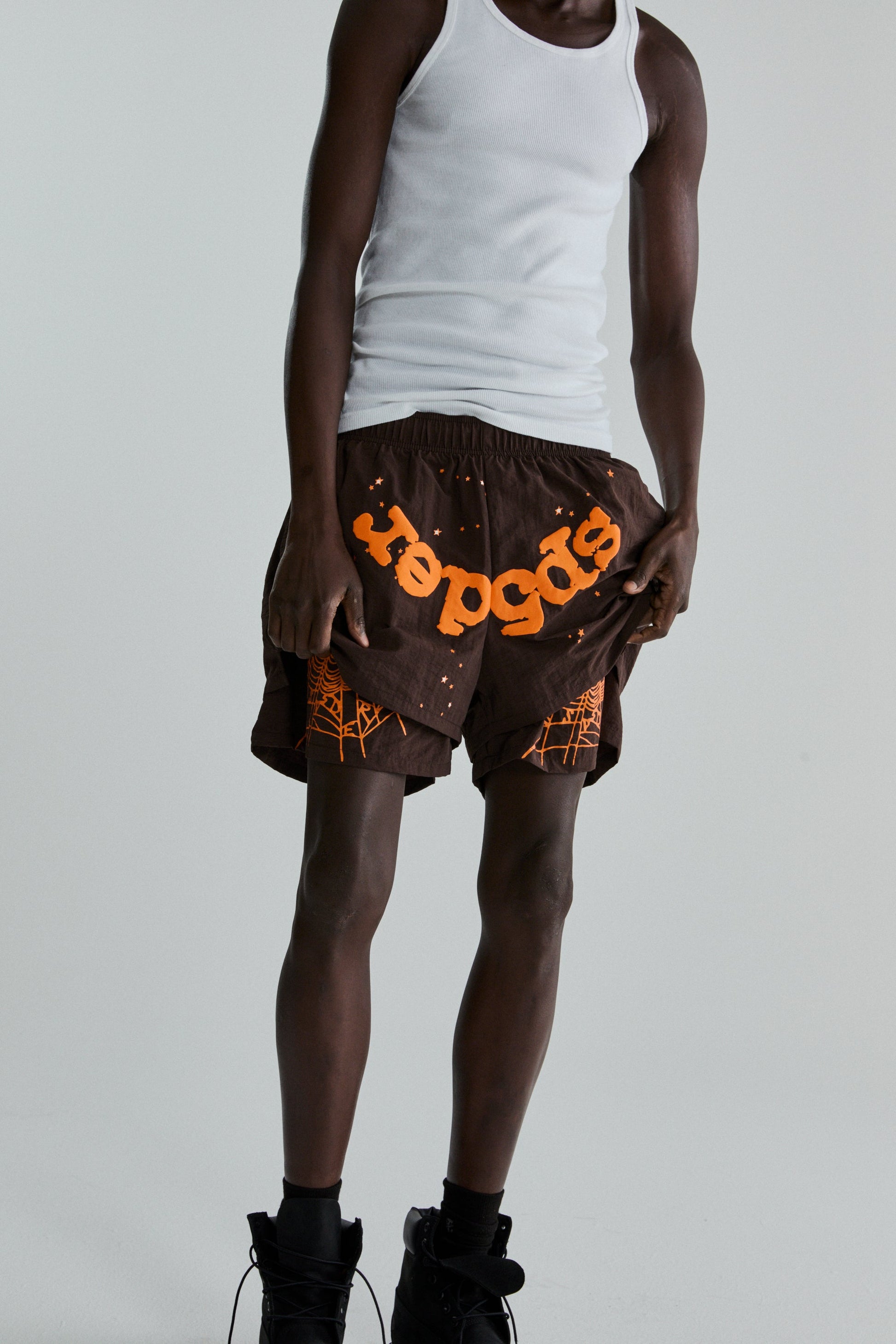BROWN OG WEB DOUBLE LAYER SHORTS ON MODEL