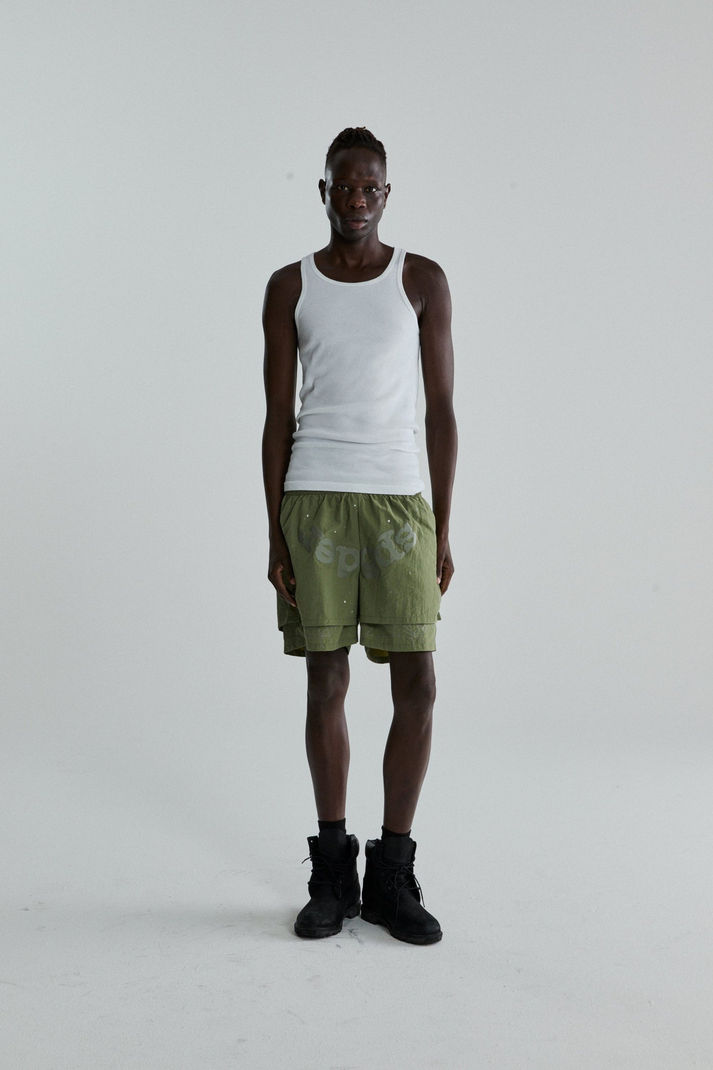 SAGE GREEN OG WEB DOUBLE LAYER SHORTS ON MODEL