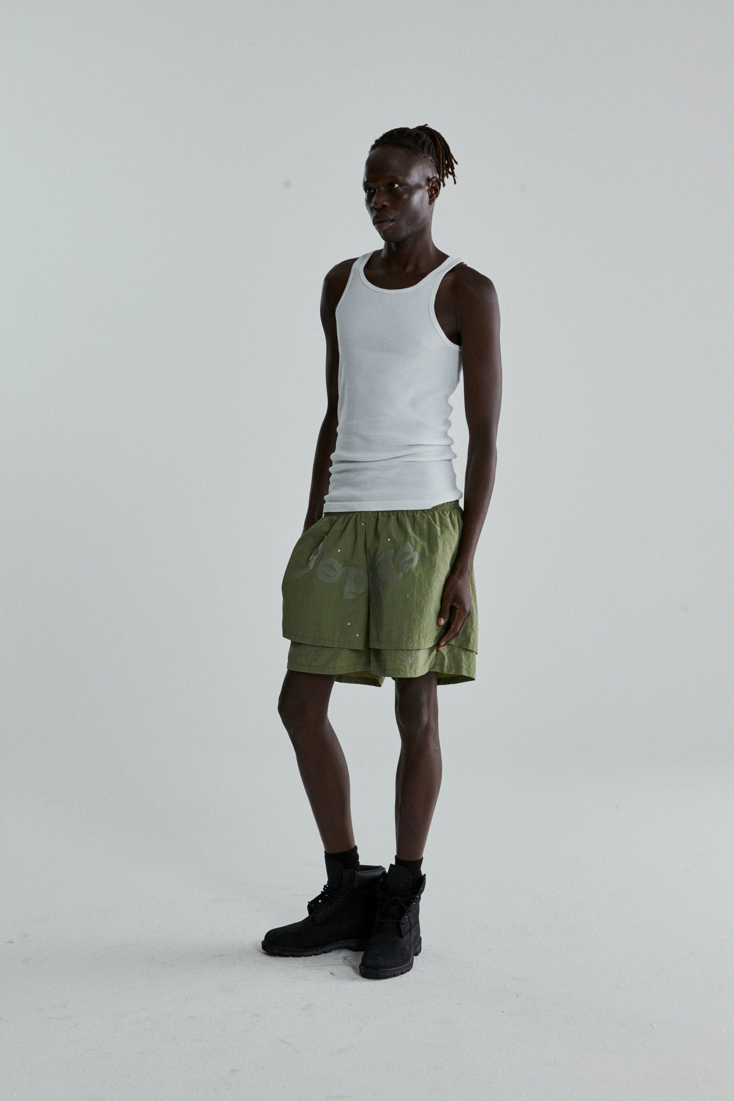 SAGE GREEN OG WEB DOUBLE LAYER SHORTS ON MODEL