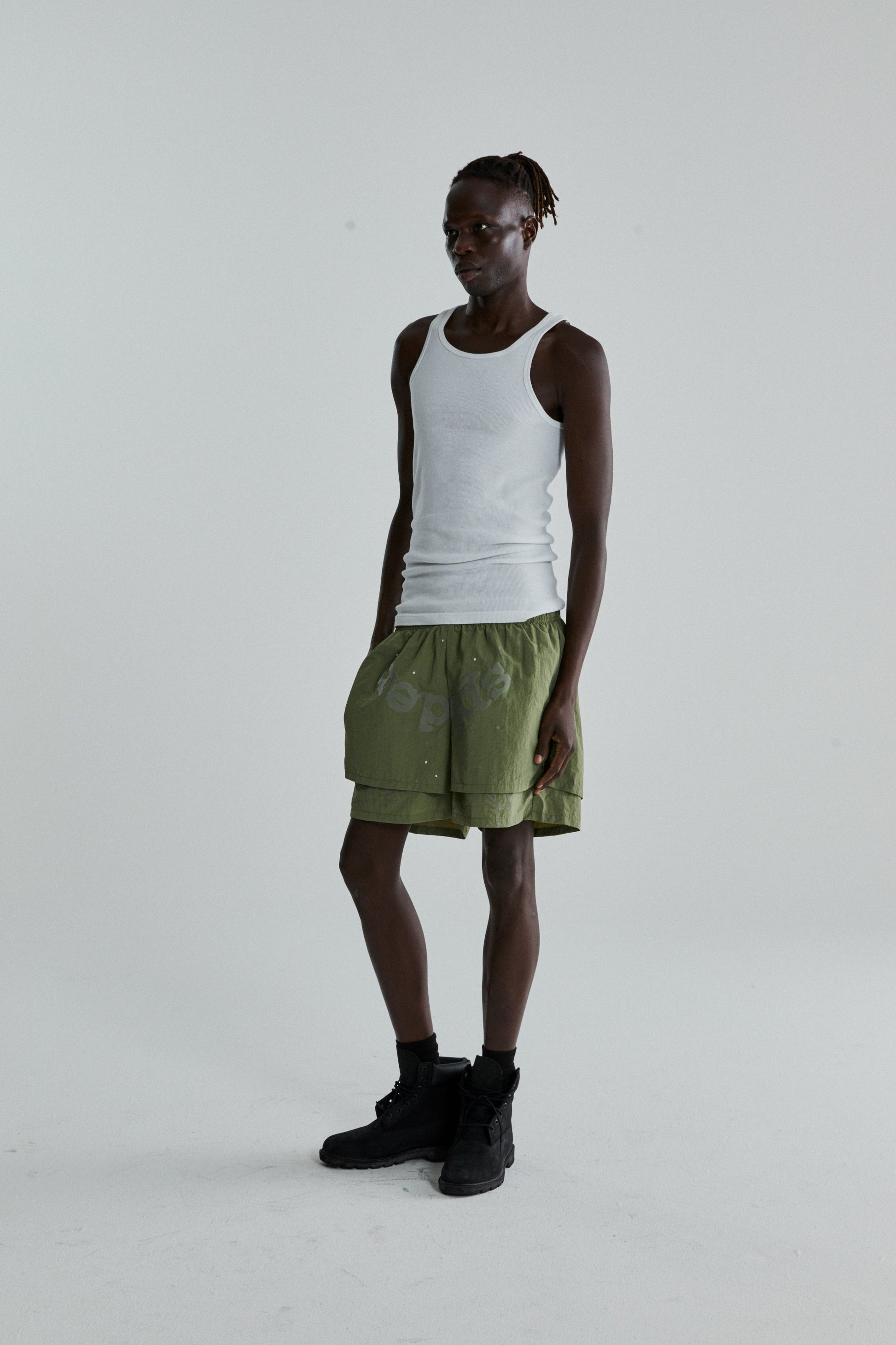 SAGE GREEN OG WEB DOUBLE LAYER SHORTS ON MODEL