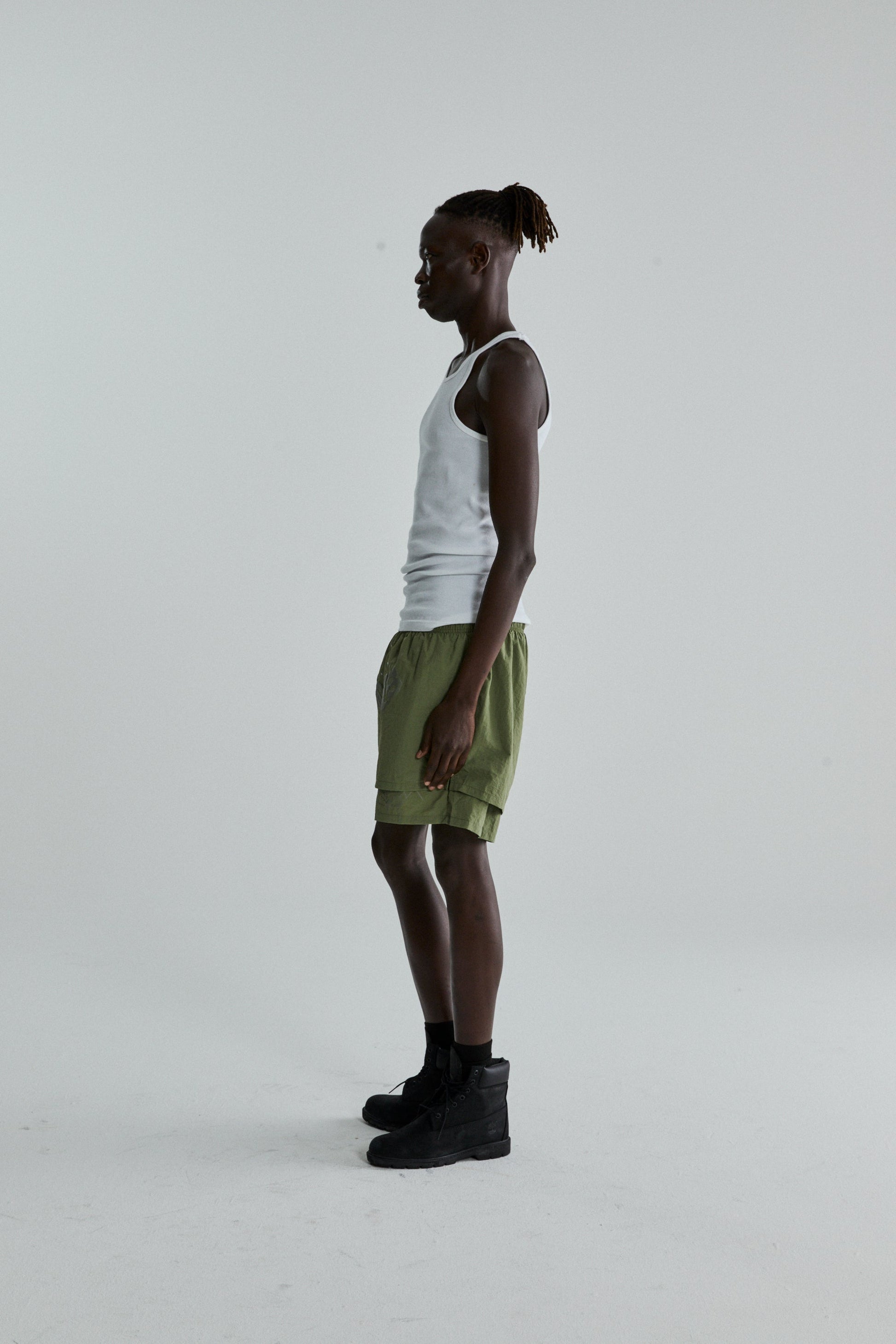 SAGE GREEN OG WEB DOUBLE LAYER SHORTS ON MODEL