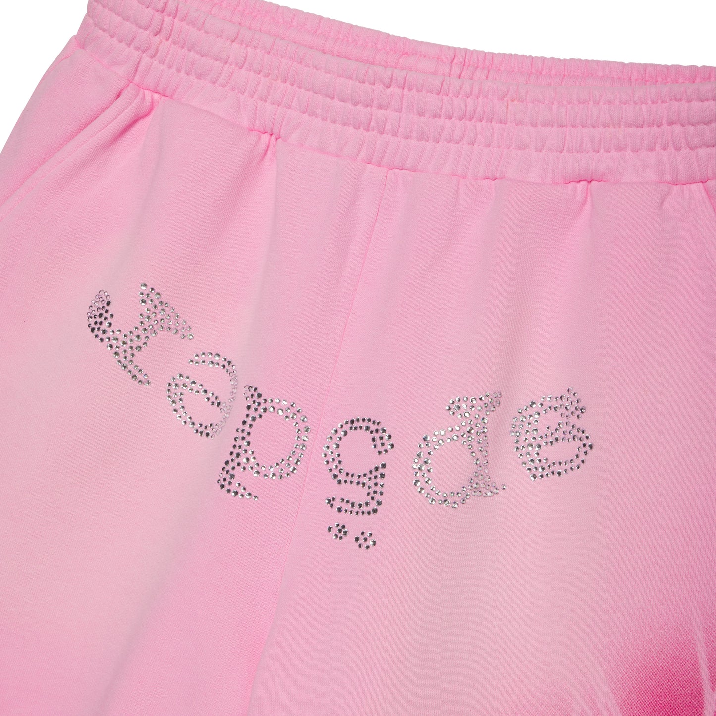 Pink cotton fleece sweatshorts with rhinestone "SP5DER" graphic and spray web design.