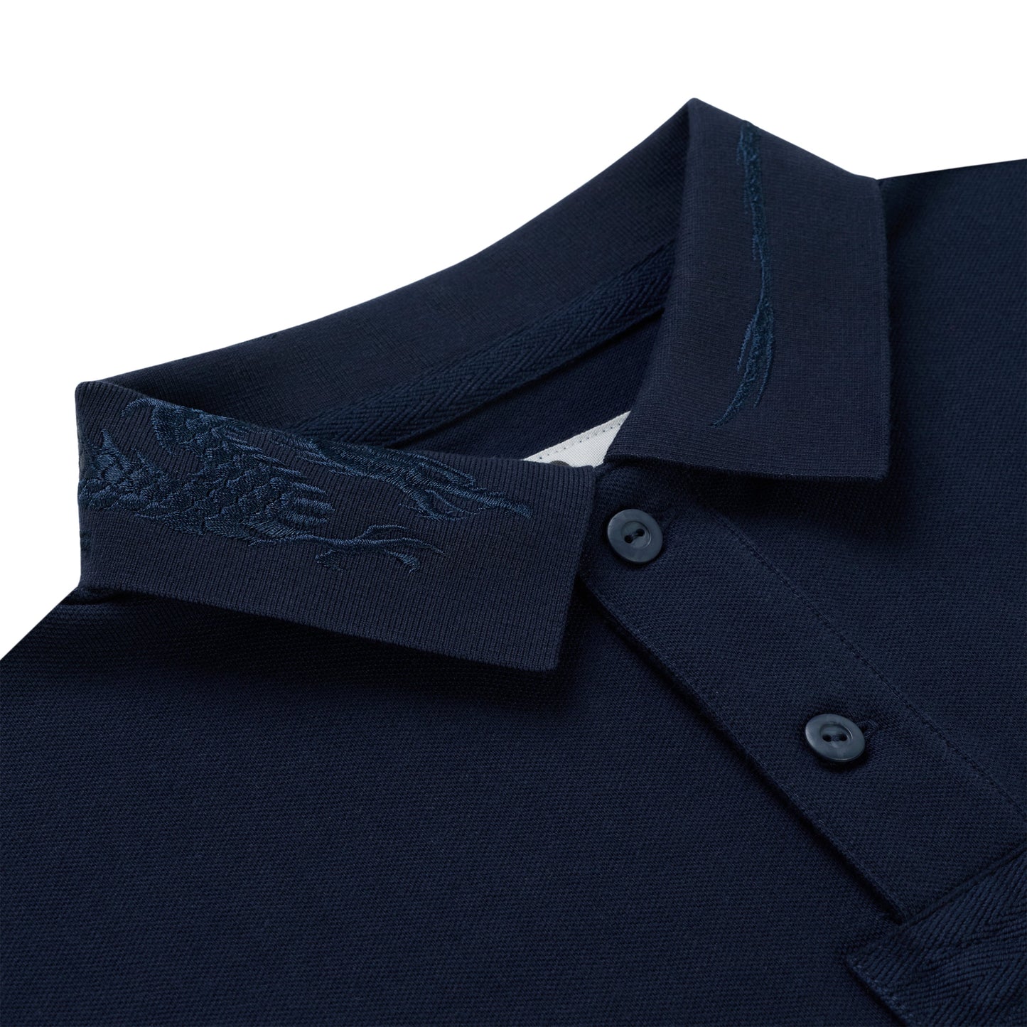 Navy blue pique polo shirt with intricate dark blue embroidery on collar and placket.