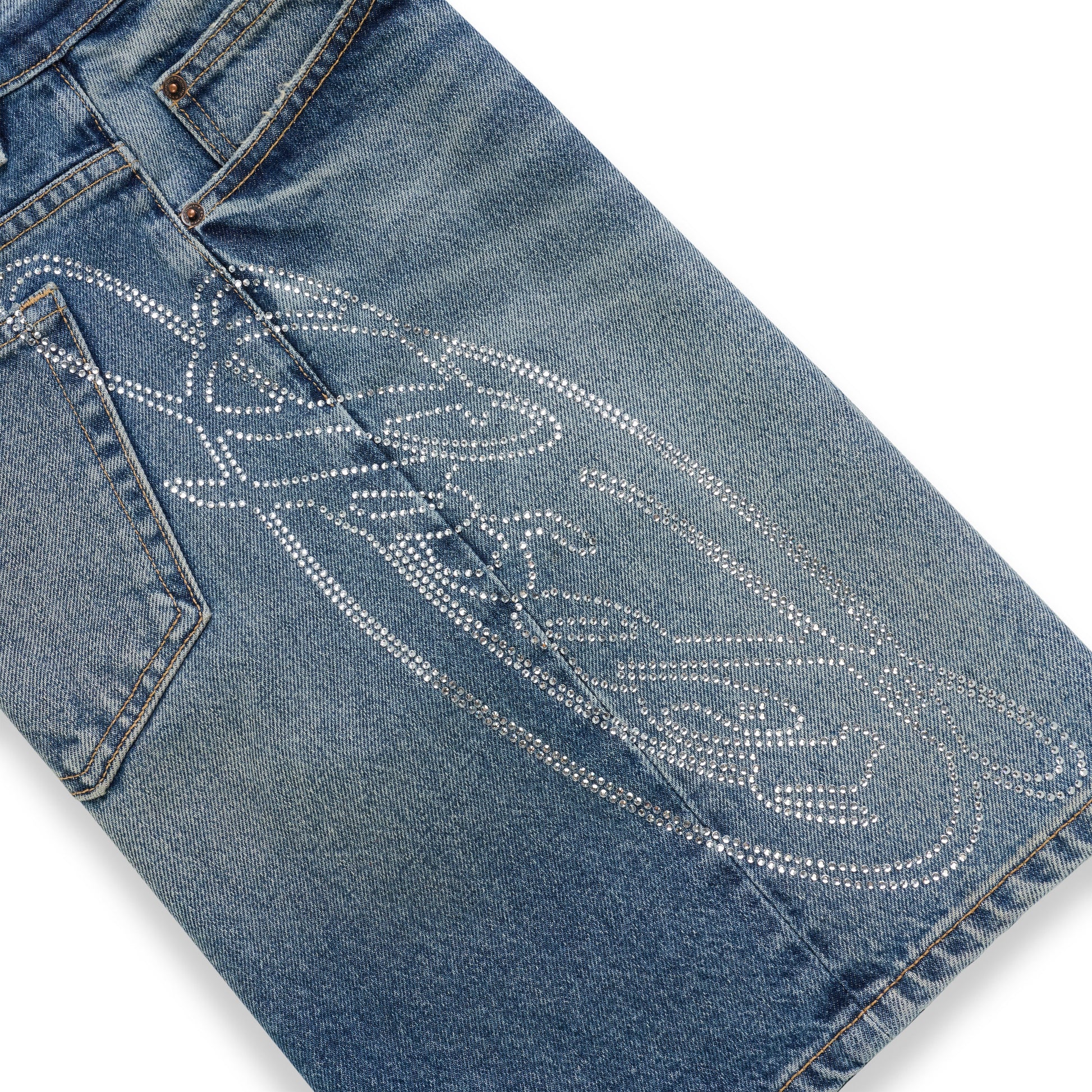 Blue denim short with a large, intricate rhinestone web design on the back.