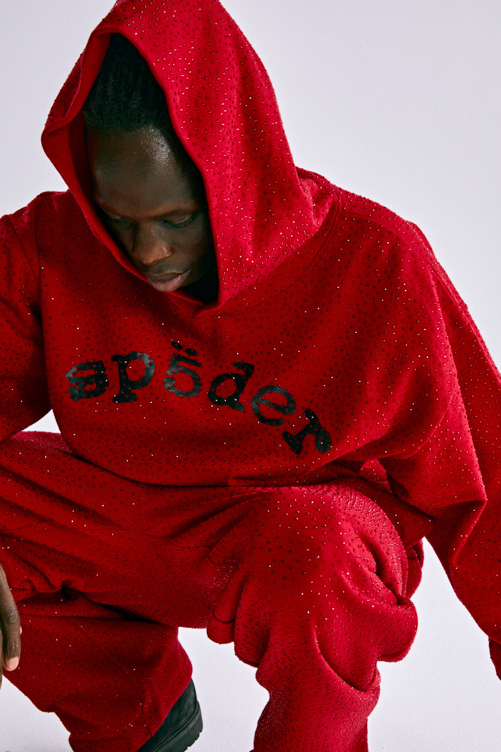 RED WEBSTONE AOP HOODIE ON MODEL