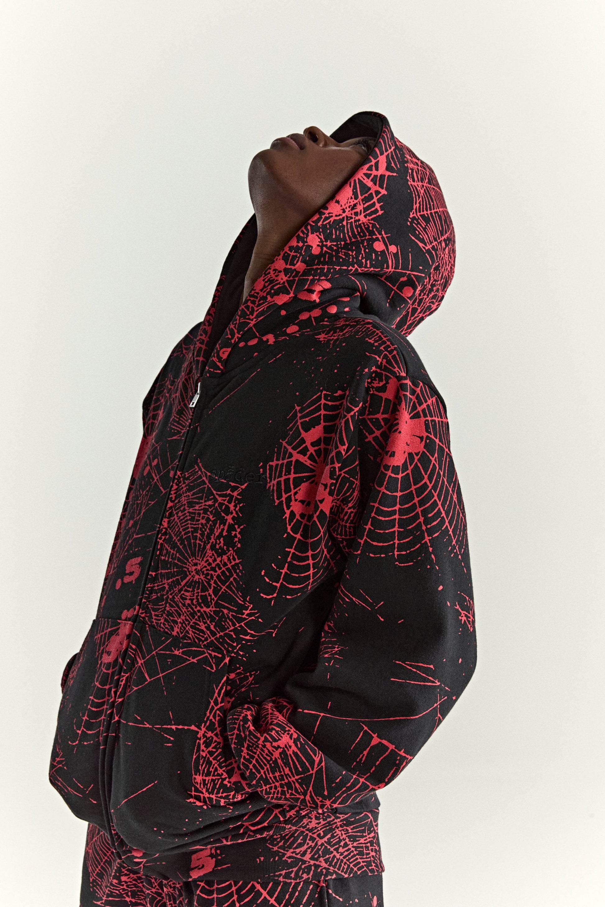 BLACK AOP WEB ZIP UP V2 HOODIE ON MODEL