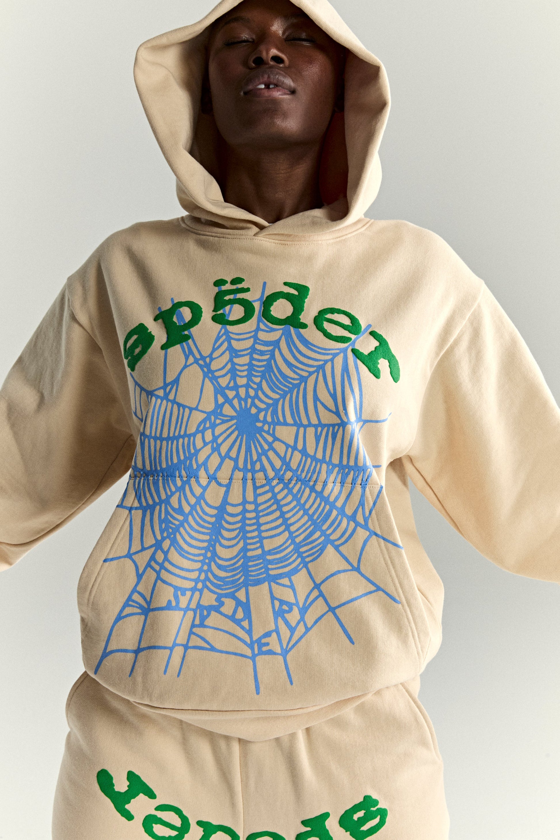 CREAM OG WEB V2 HOODIE ON MODEL