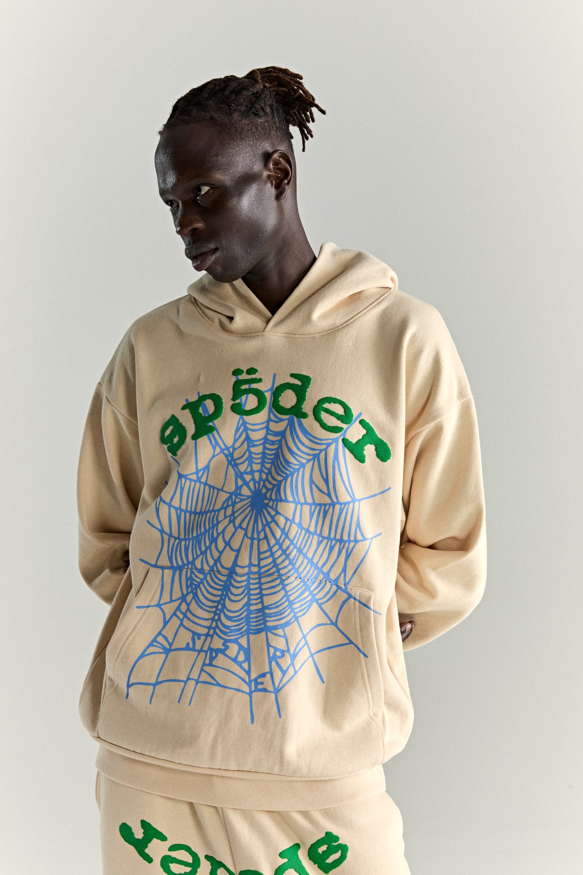 CREAM OG WEB V2 HOODIE ON MODEL