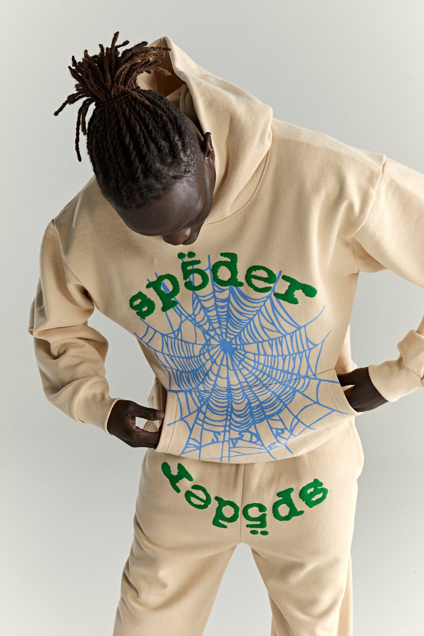 CREAM OG WEB V2 HOODIE ON MODEL
