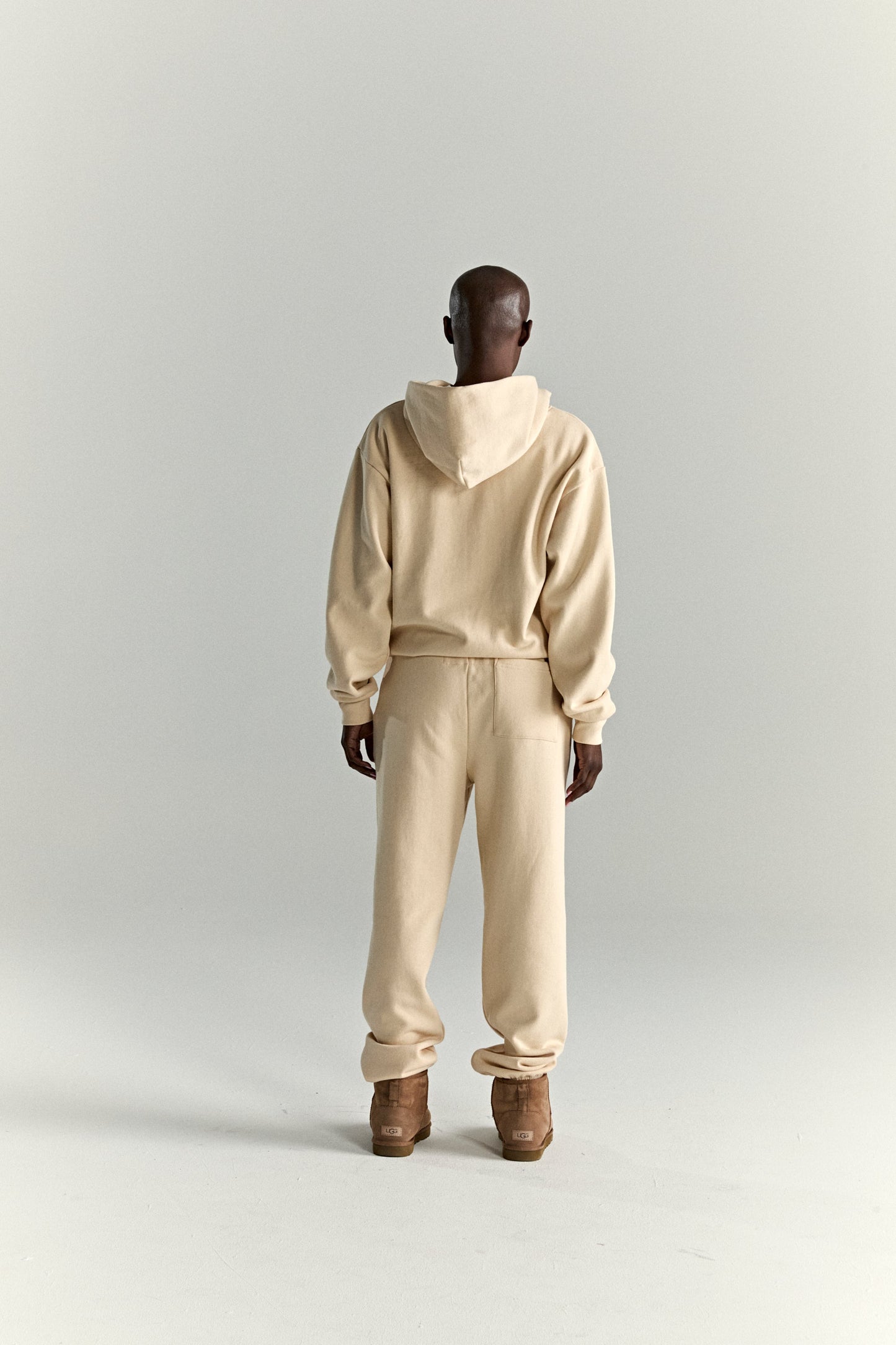 CREAM OG WEB V2 HOODIE ON MODEL