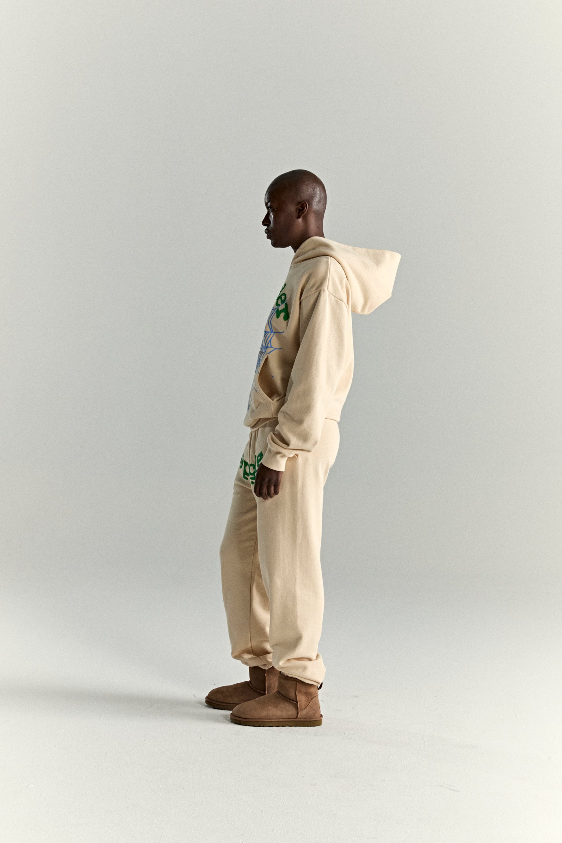 CREAM OG WEB V2 HOODIE ON MODEL